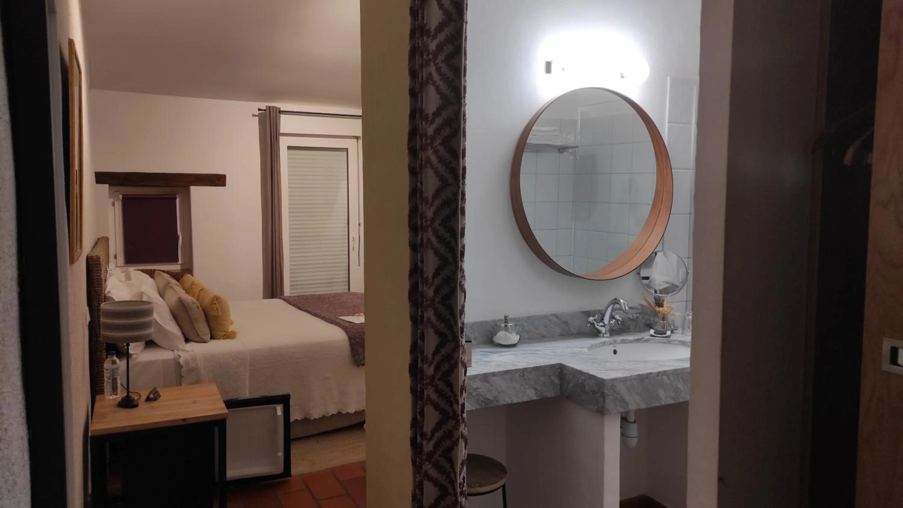 Bed in Hotel Le Mas Trilles