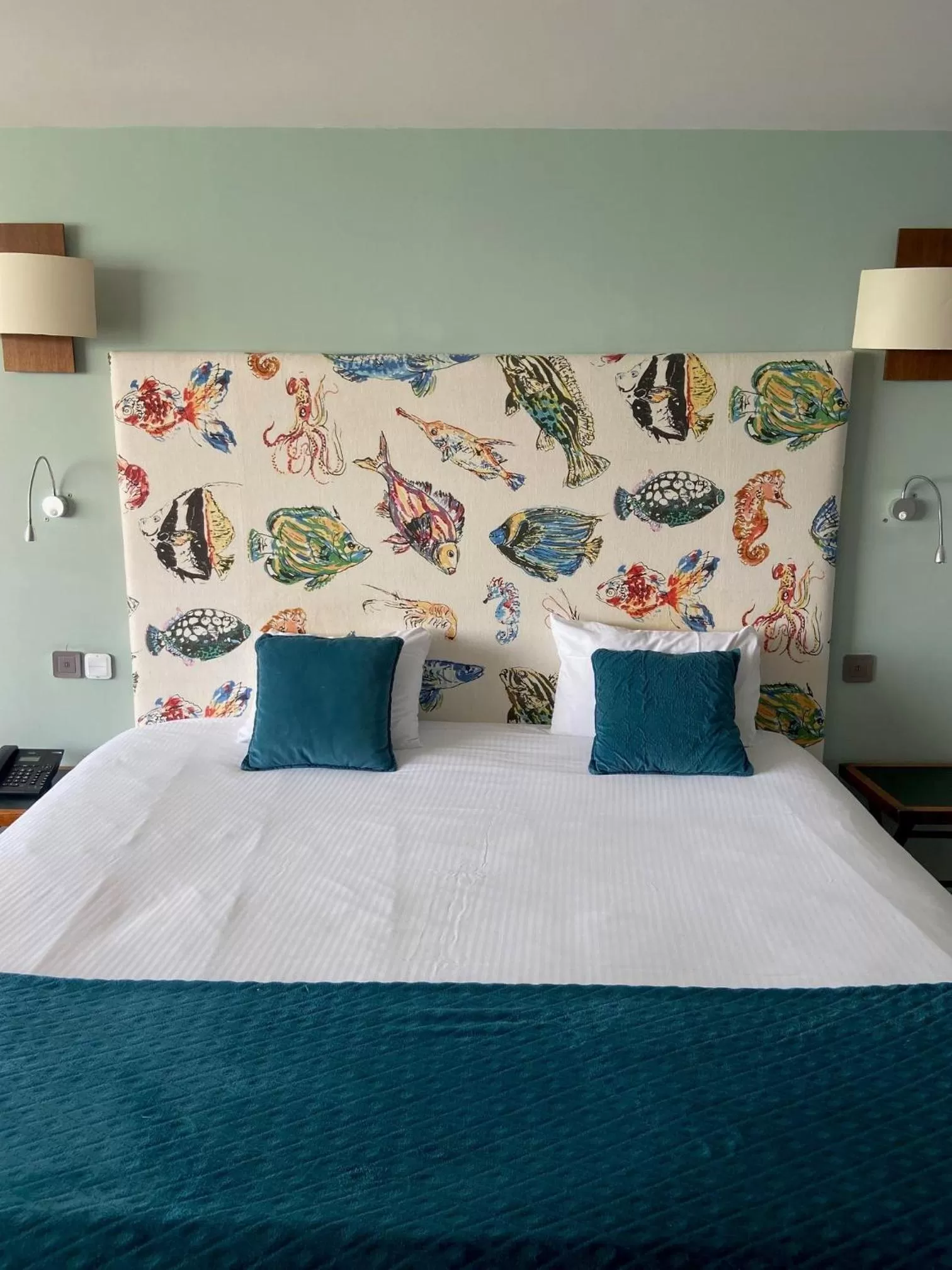 Bed in LOGIS HOTEL - La Petite Rade