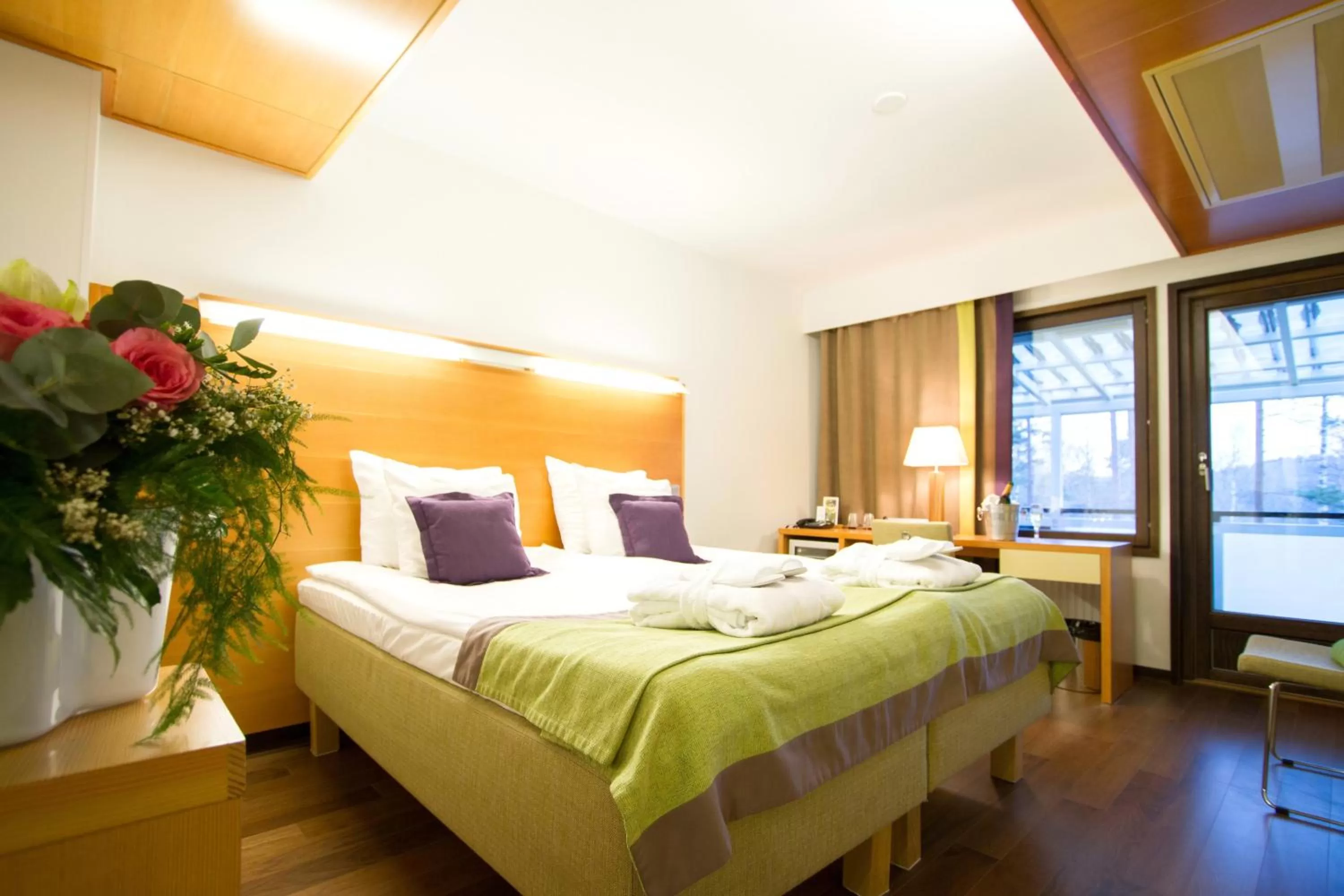 Bed in Saimaanranta Resort by Anttolanhovi