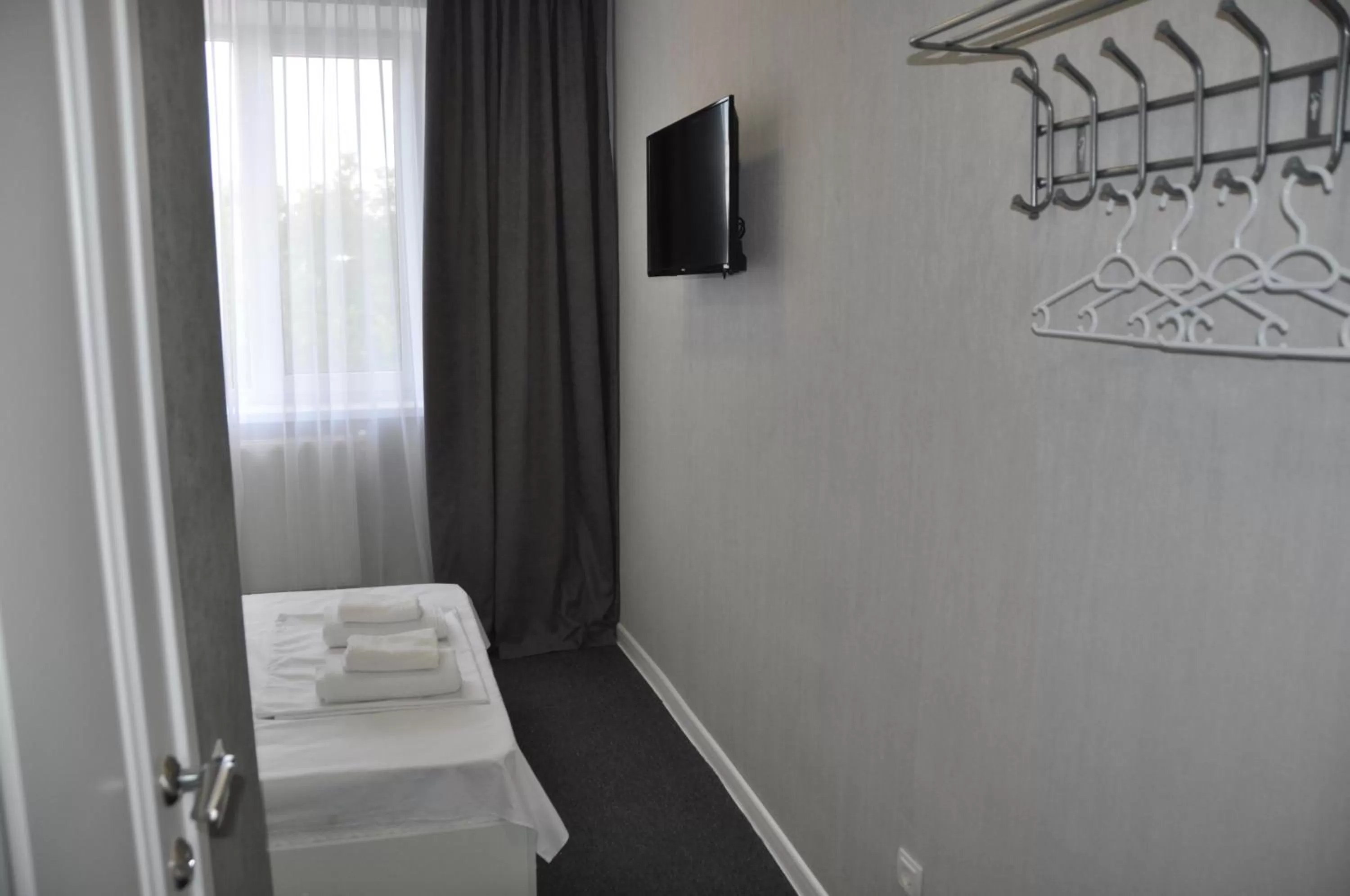 TV/Entertainment Center in MEDELEAN HOTEL