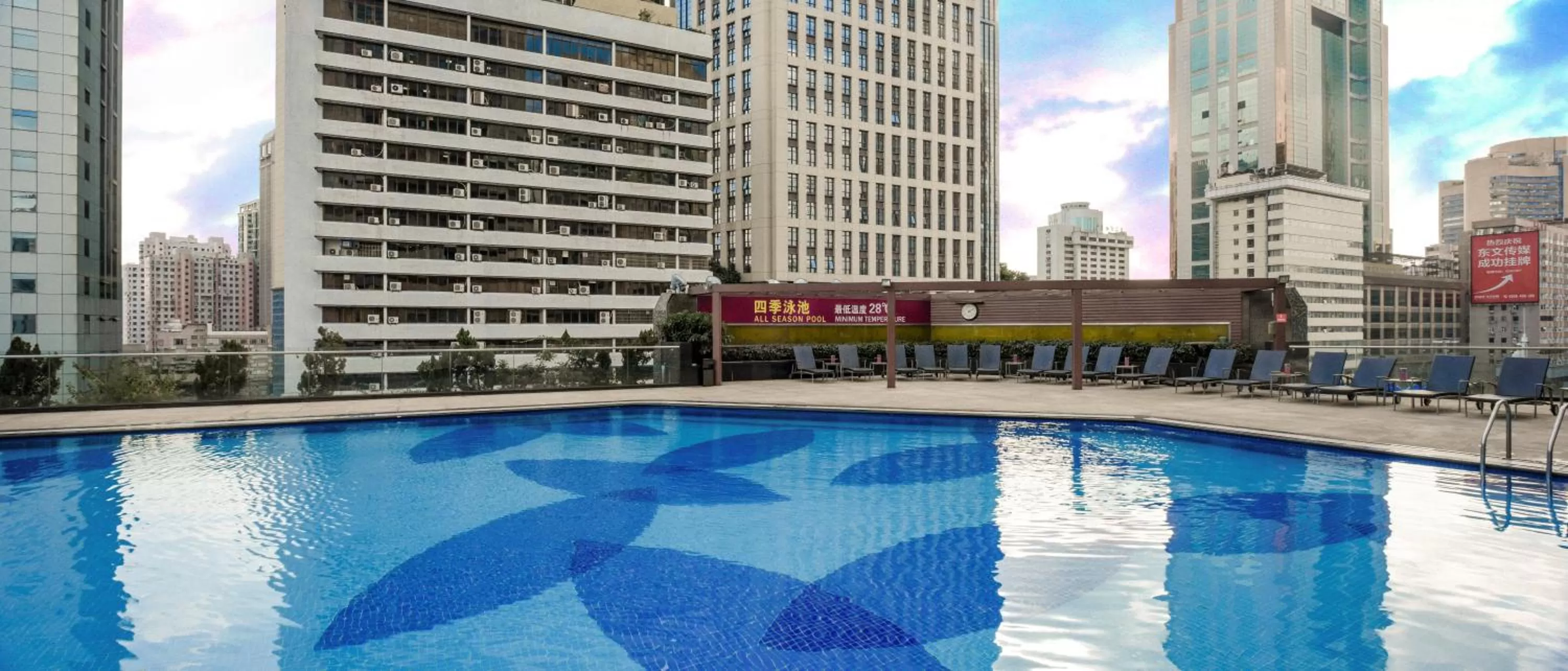 Swimming pool in Crowne Plaza Guangzhou City Centre by IHG