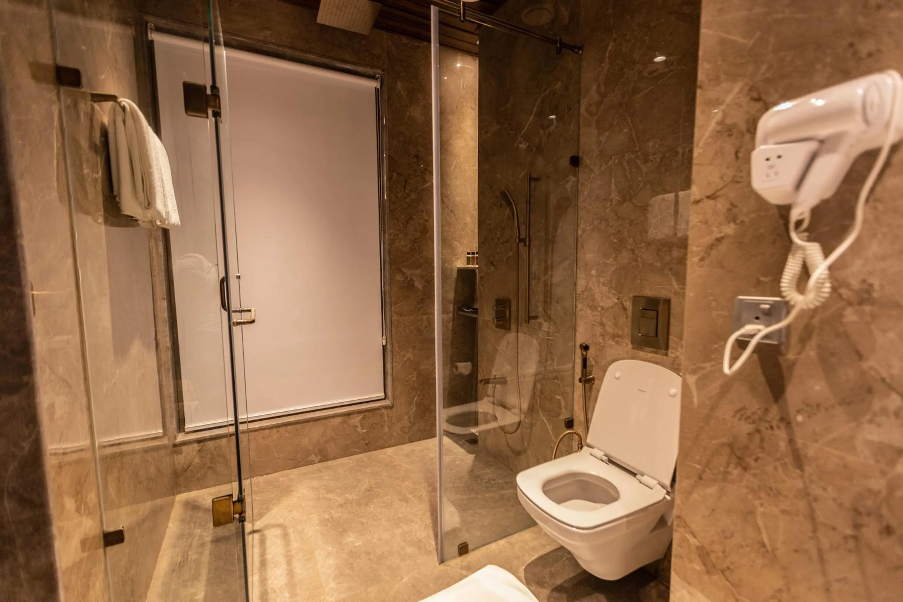 Toilet in The Corinthians Resort