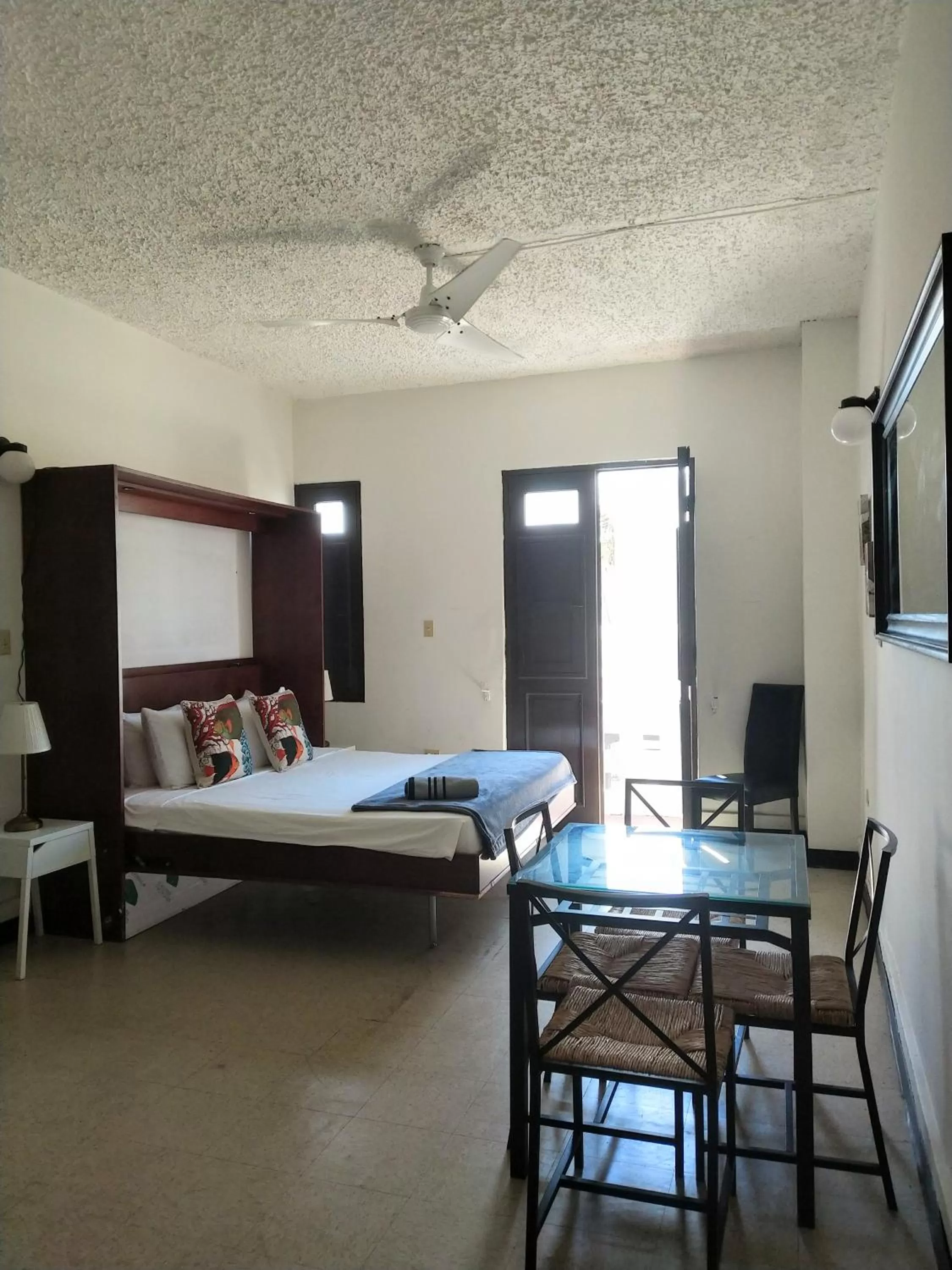 Bed in La Capitana Old San Juan Building