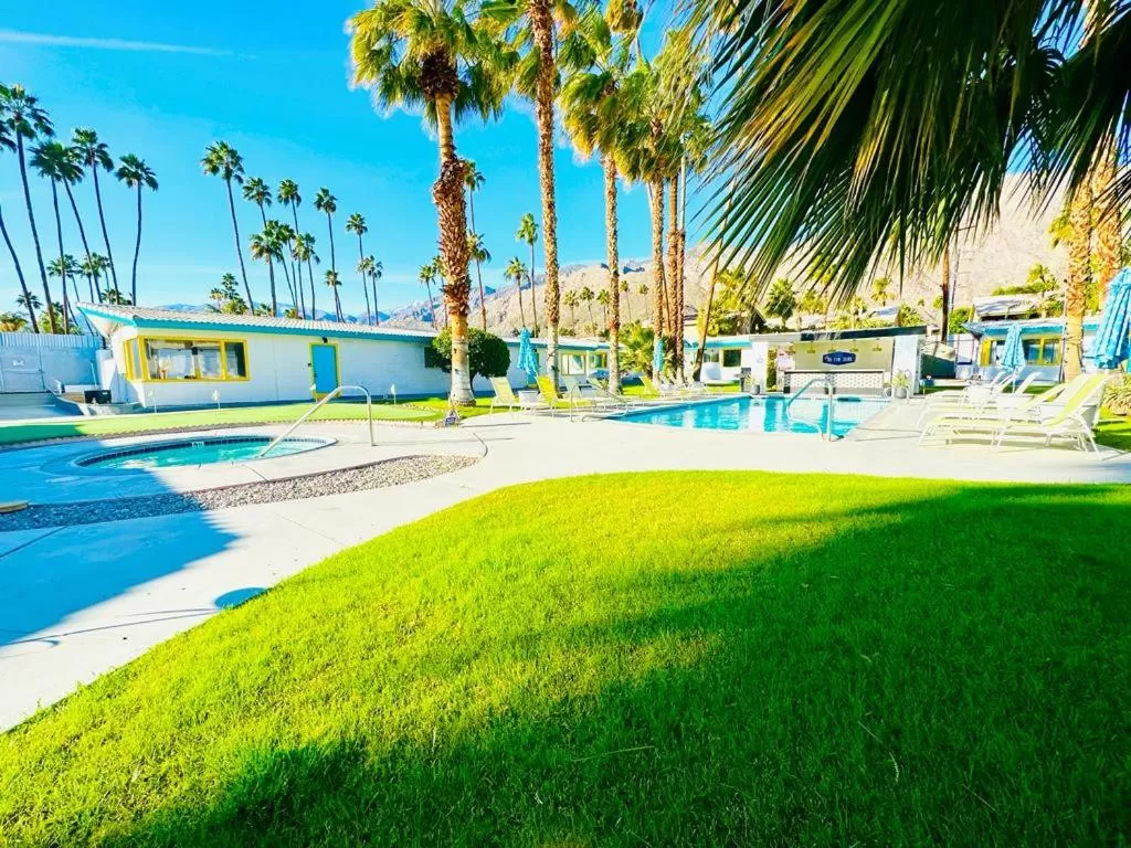 Swimming pool in A PLACE IN THE SUN Hotel - ADULTS ONLY Big Units, 24h Heated Pool & Spa in 1 Acre Park Prime Location, DOG Friendly, TOP Midcentury Modern Boutique Hotel