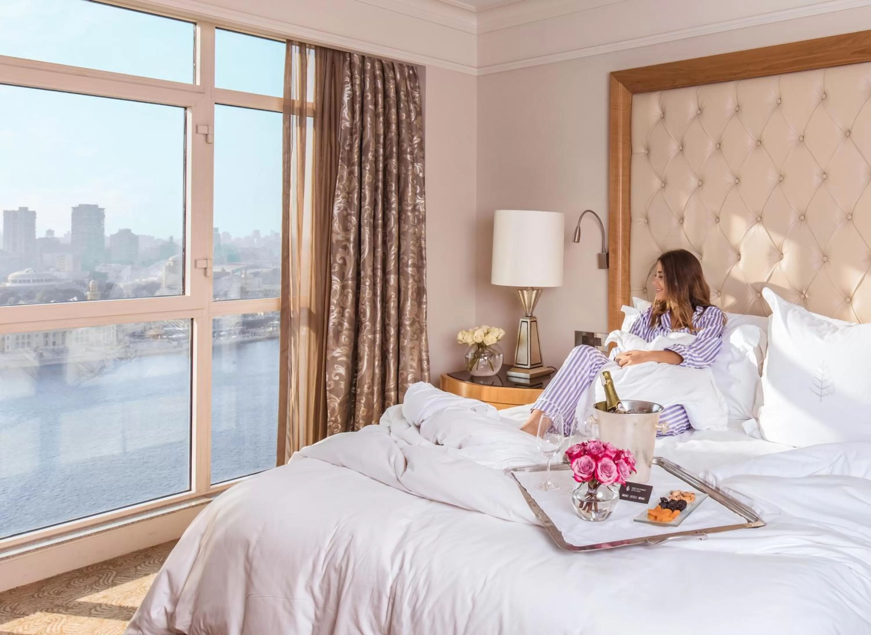 People, Bed in Four Seasons Hotel Cairo at Nile Plaza