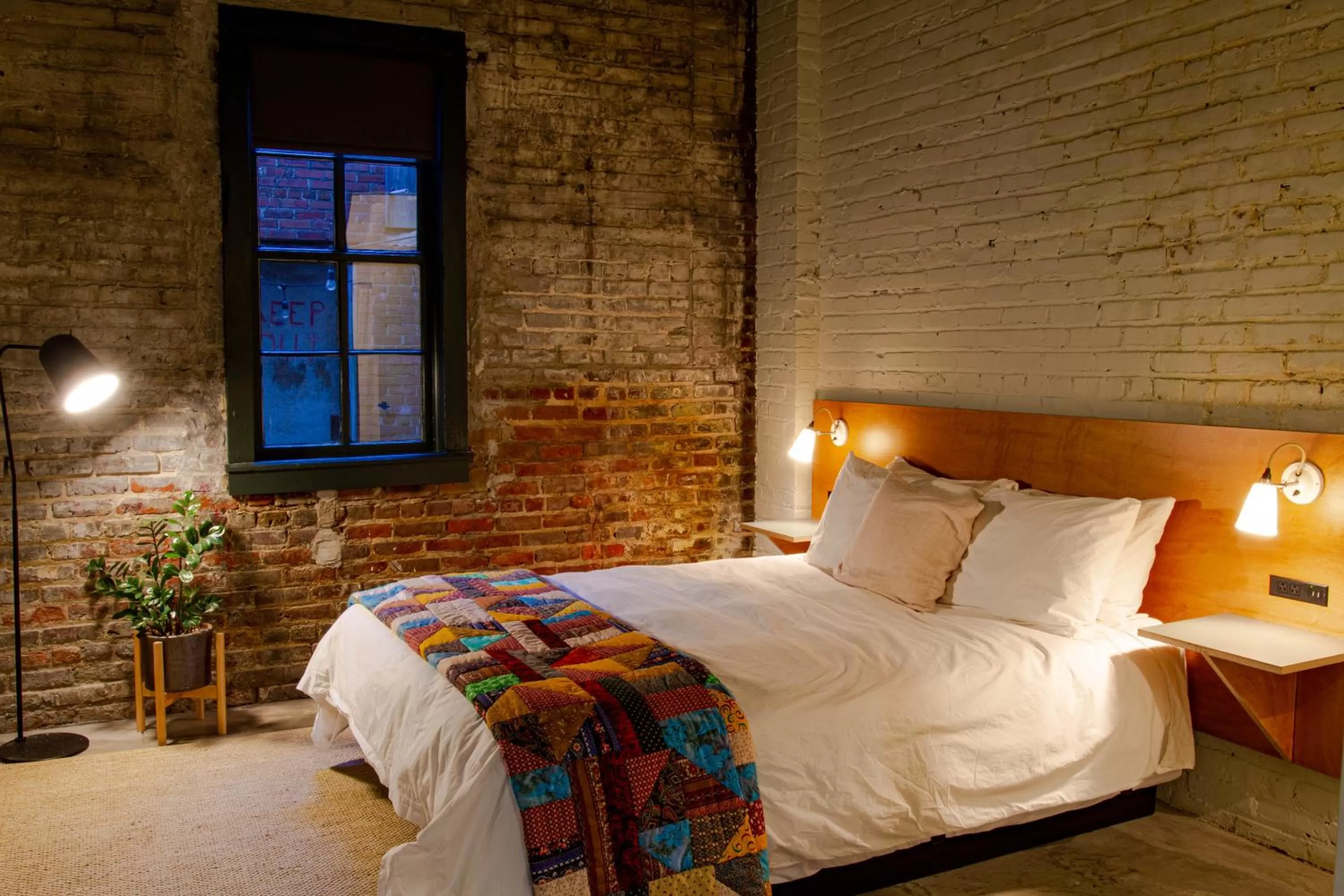 Bed in Travelers Hotel