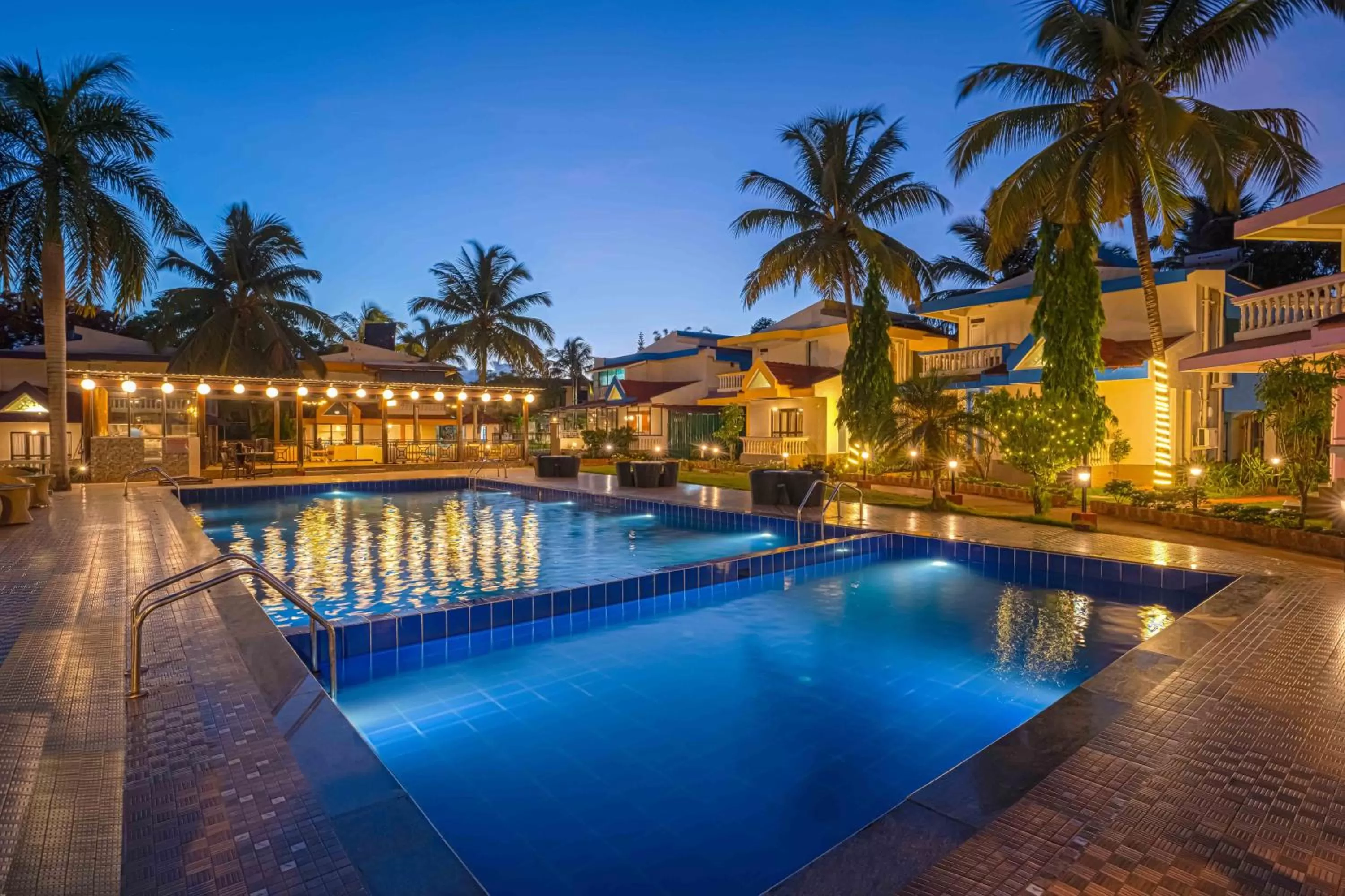 Swimming pool in Country Inn Goa Varca Beach - 2 minutes walk to the beach