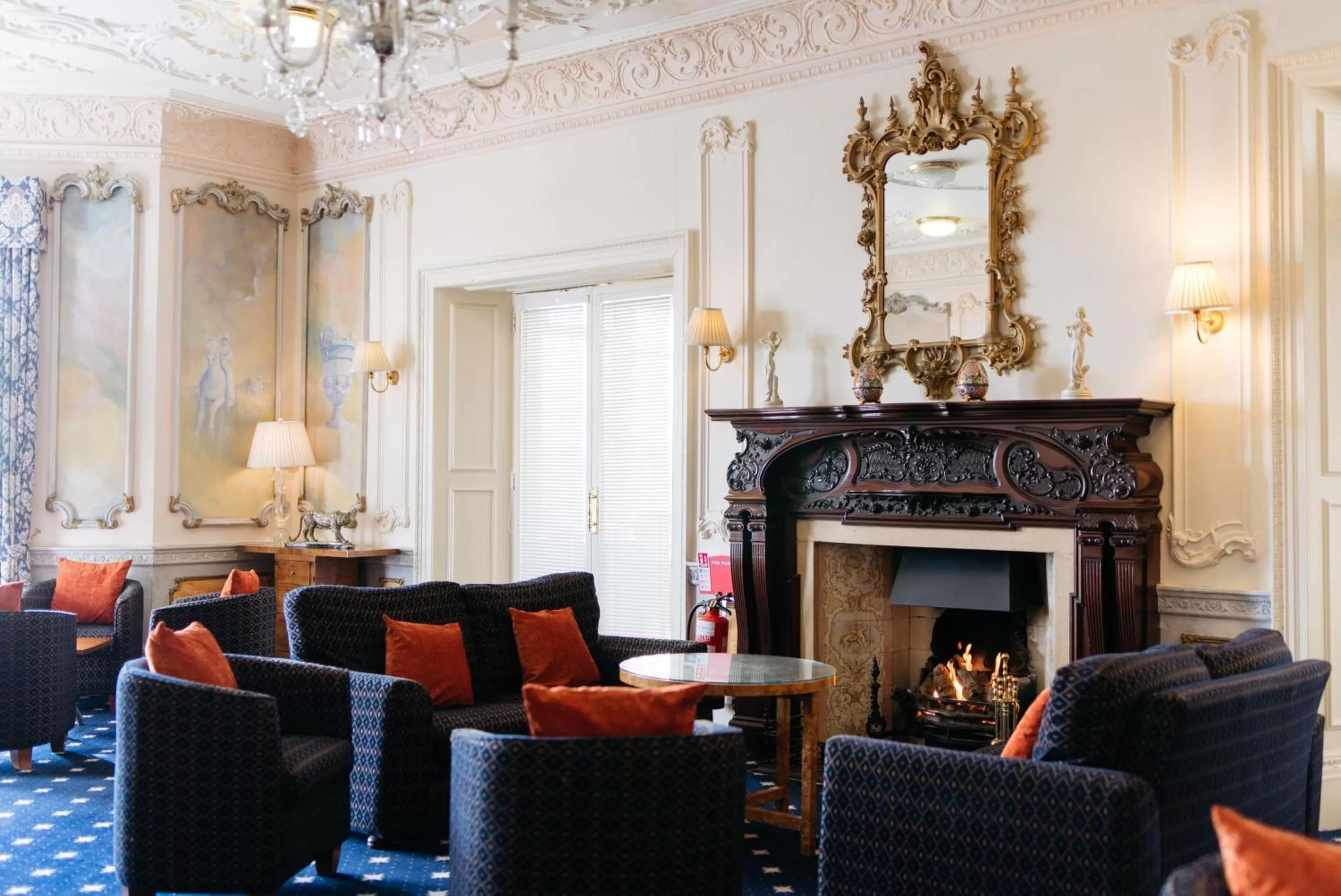 Communal lounge/ TV room in The Palace Hotel