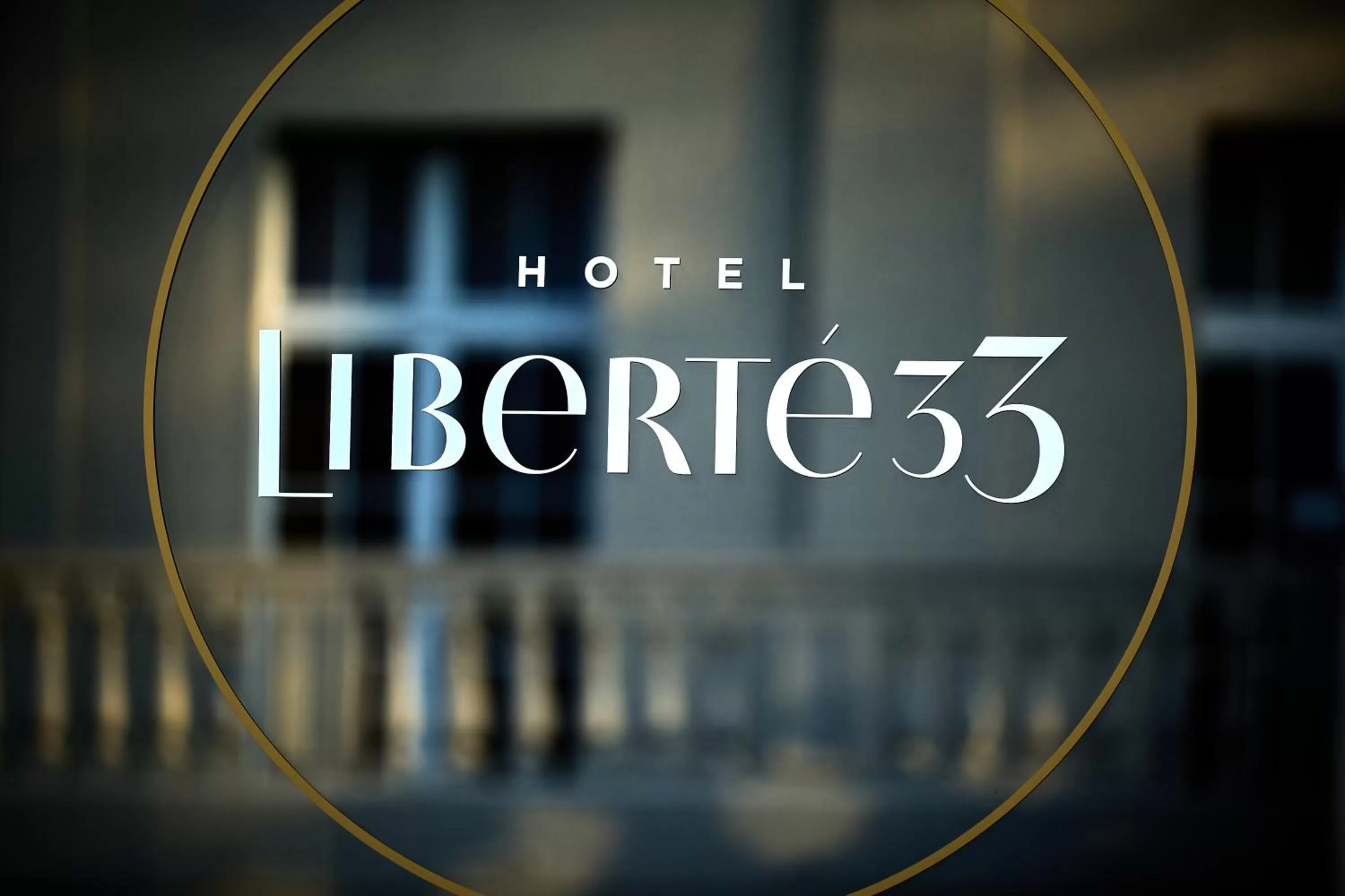 Property logo or sign in Hotel Liberté 33