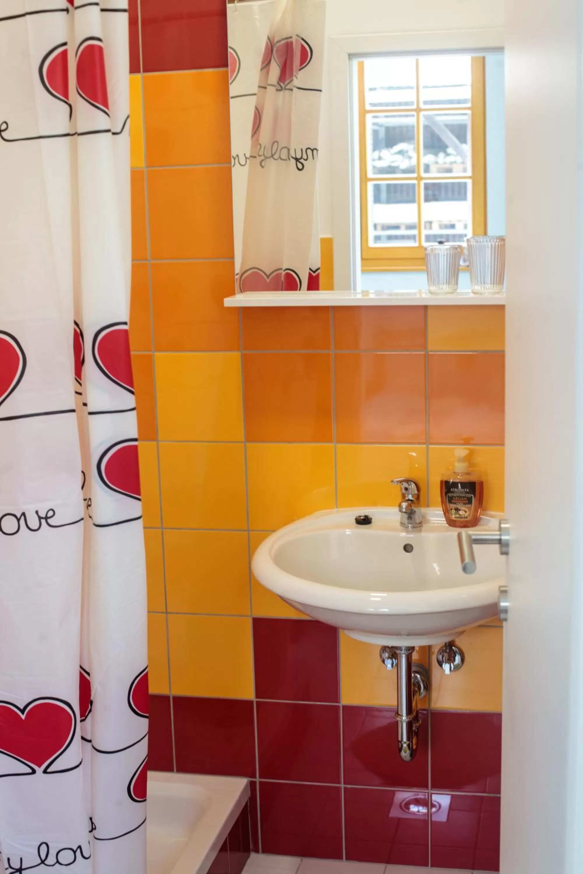 Bathroom in BikeSki family hotel, b&b, apartaments, rooms