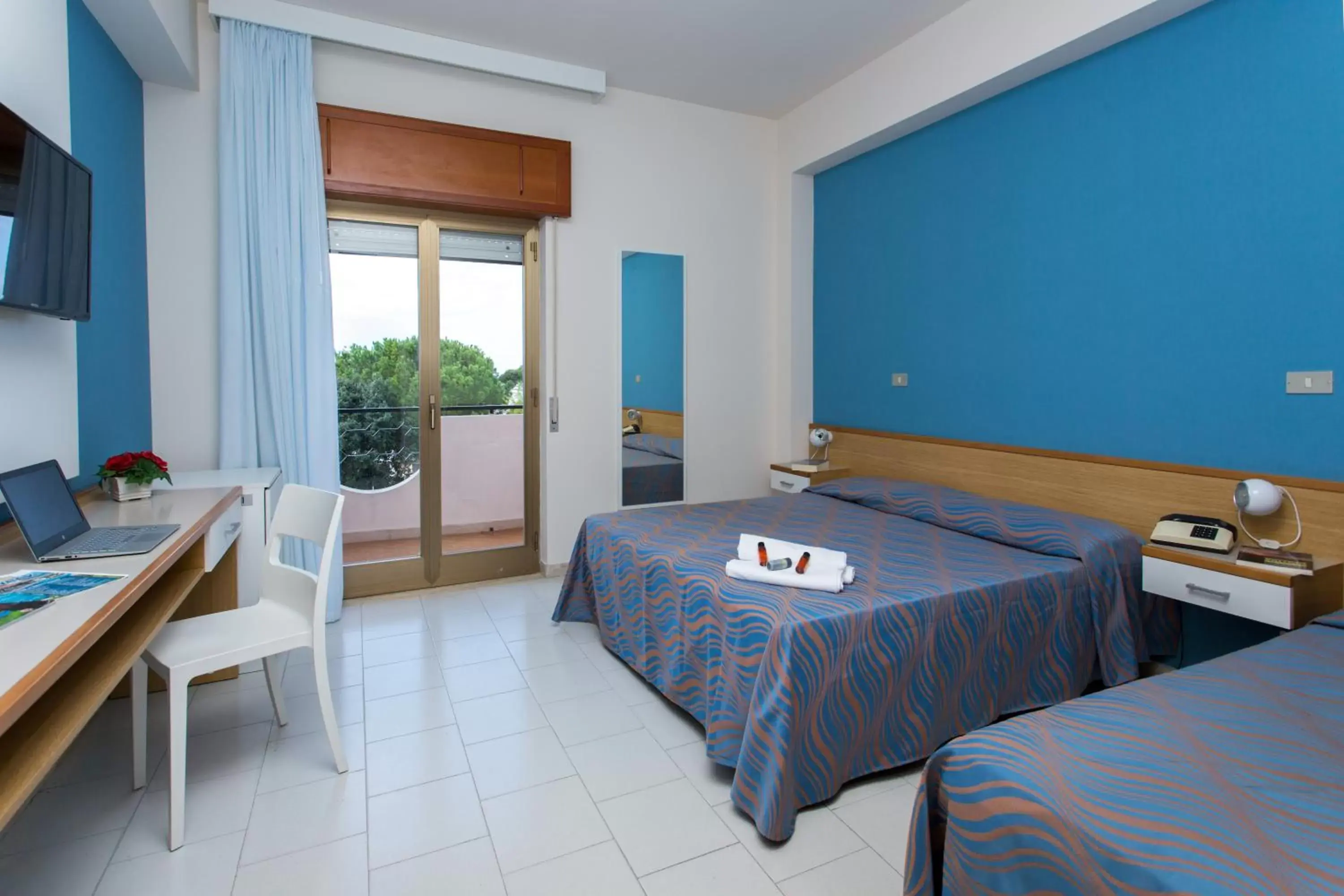 Standard Triple Room in Hotel Santa Caterina Village Club Standard Triple Room in Hotel Santa Caterina Village Club