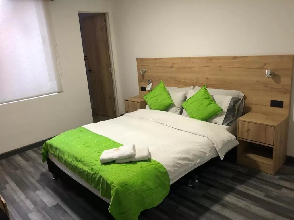Photo of the whole room, Bed in Hotel Fénix Real Bogotá