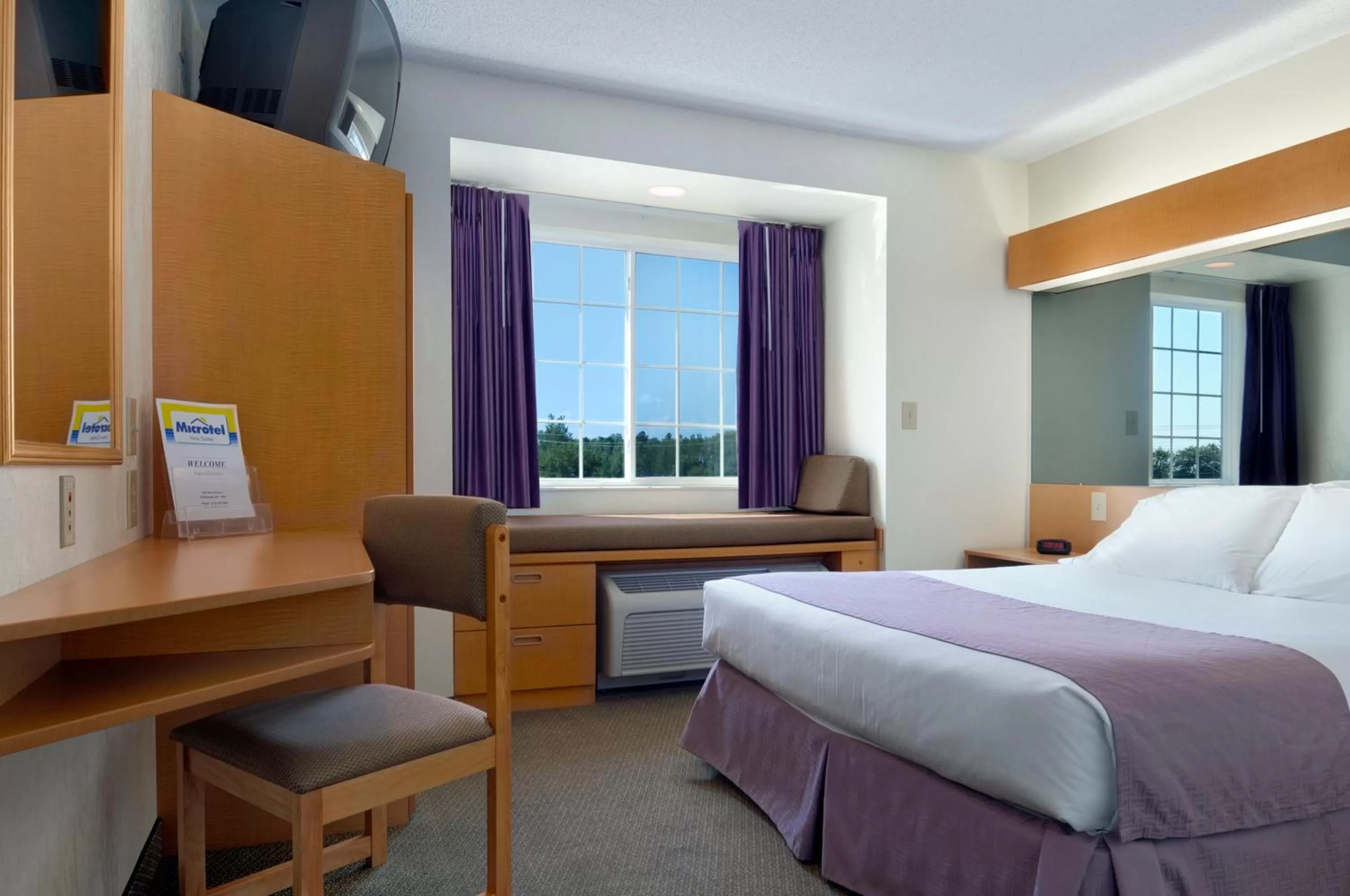 Photo of the whole room, Bed in Microtel Inn & Suites by Wyndham Plattsburgh