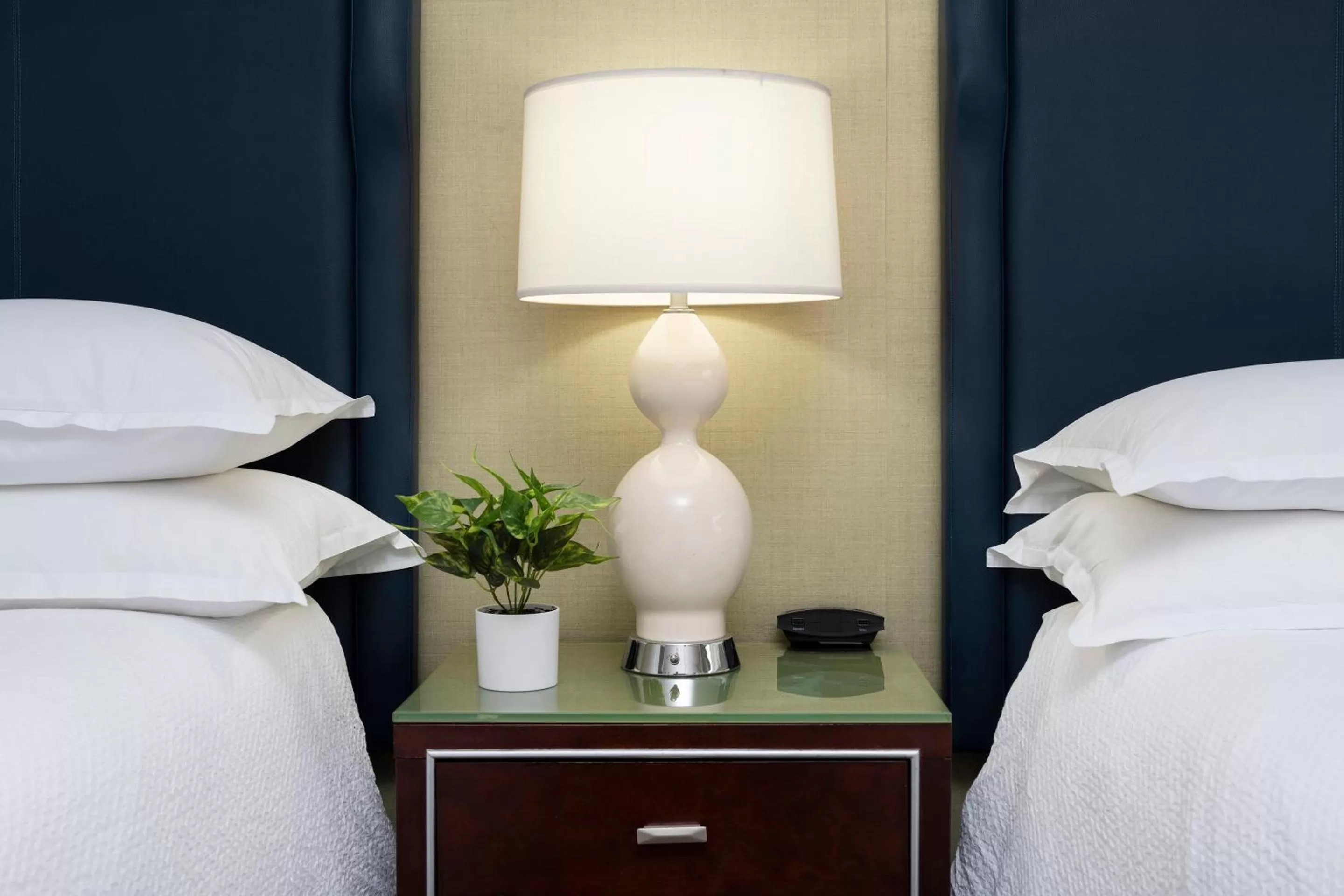 Bed in The Stamford Hotel