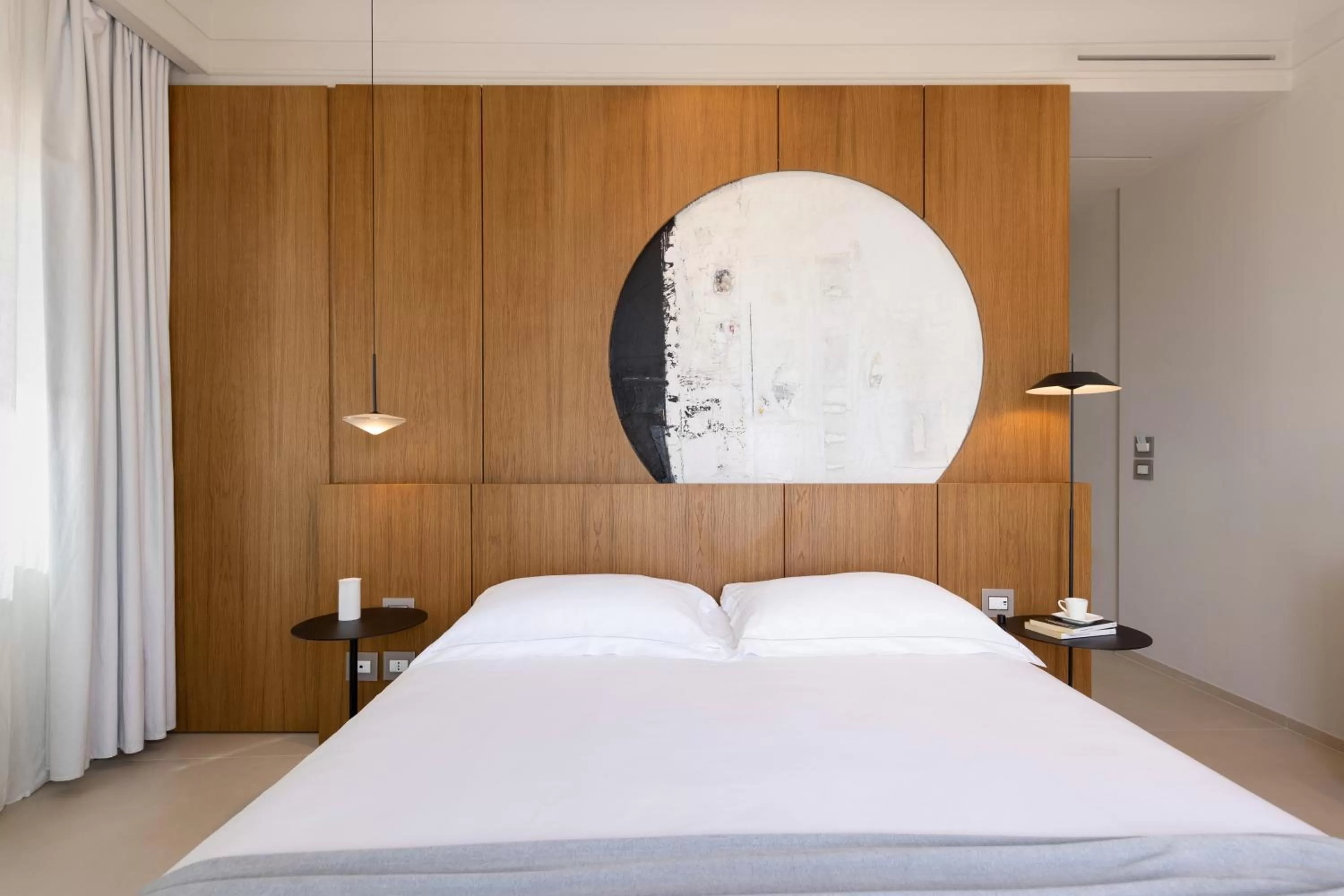 Bed in Taodomus Boutique Hotel