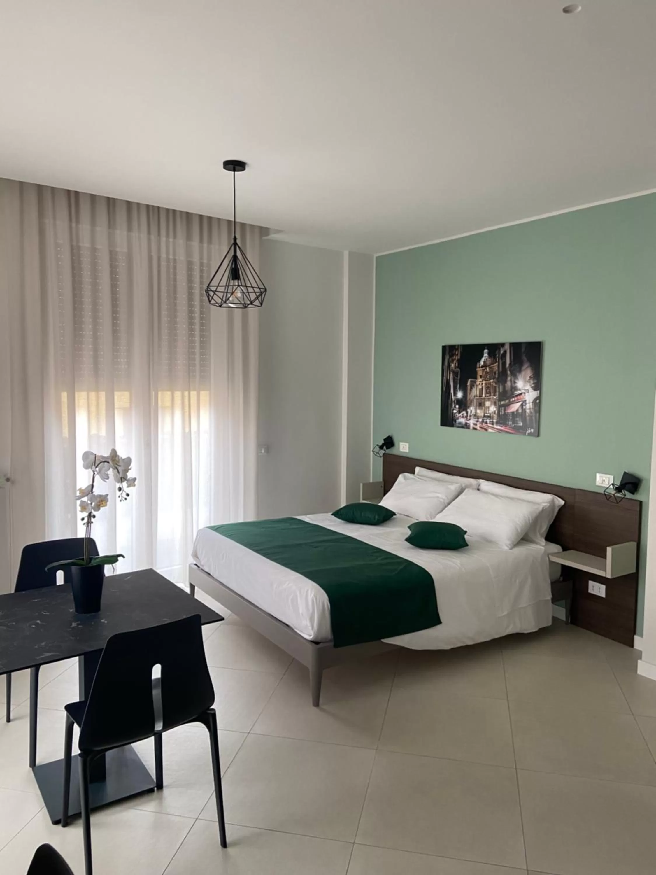 Bed in Maqueda Suites