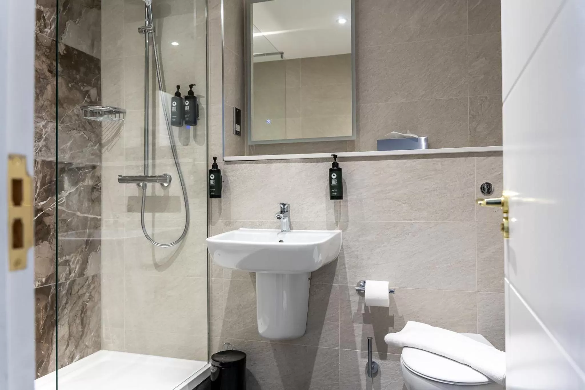 Bathroom in Trafford Hall Hotel Manchester, Trademark Collection by Wyndham