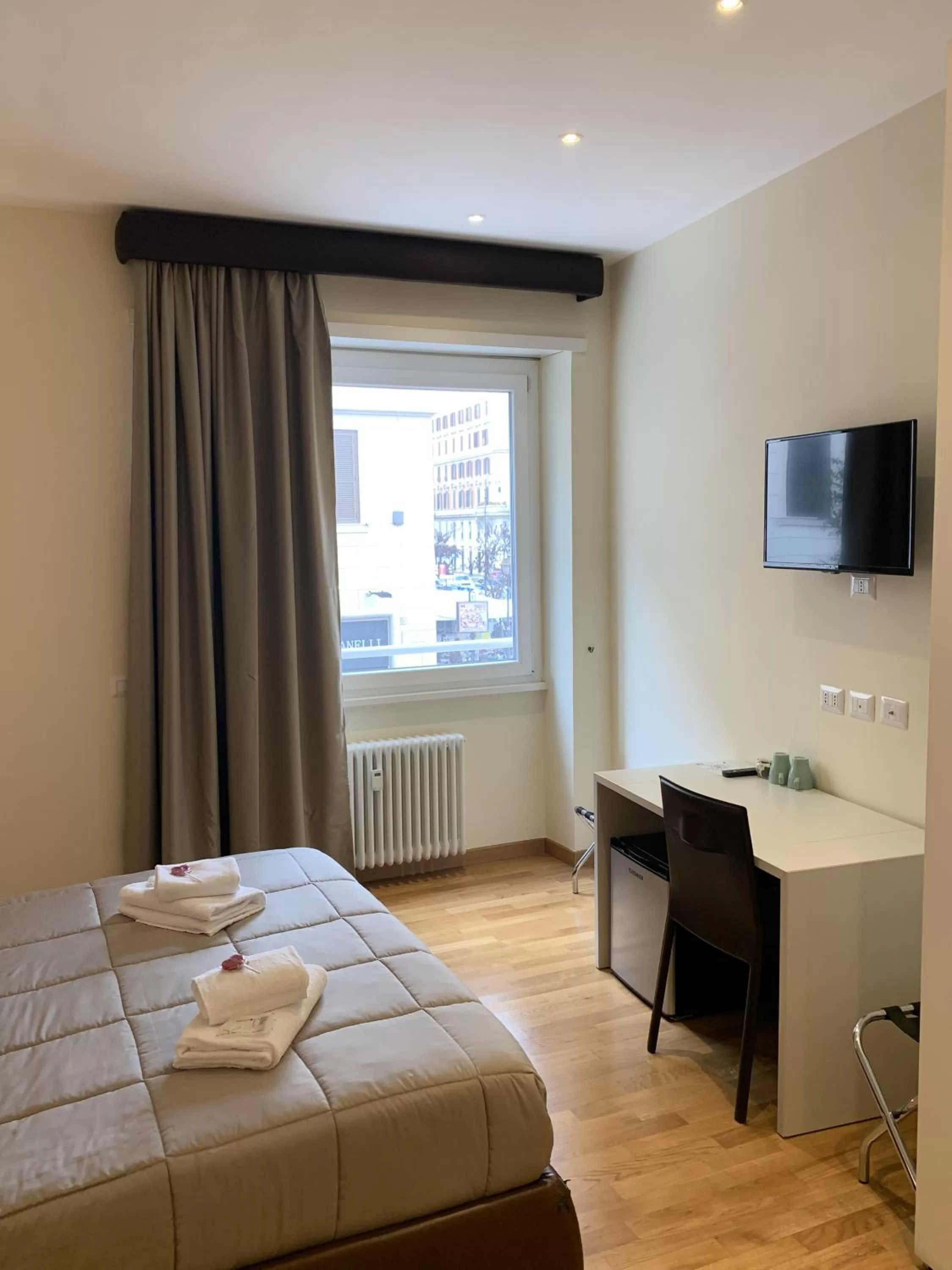 Bed in Rienzo Vatican Suites