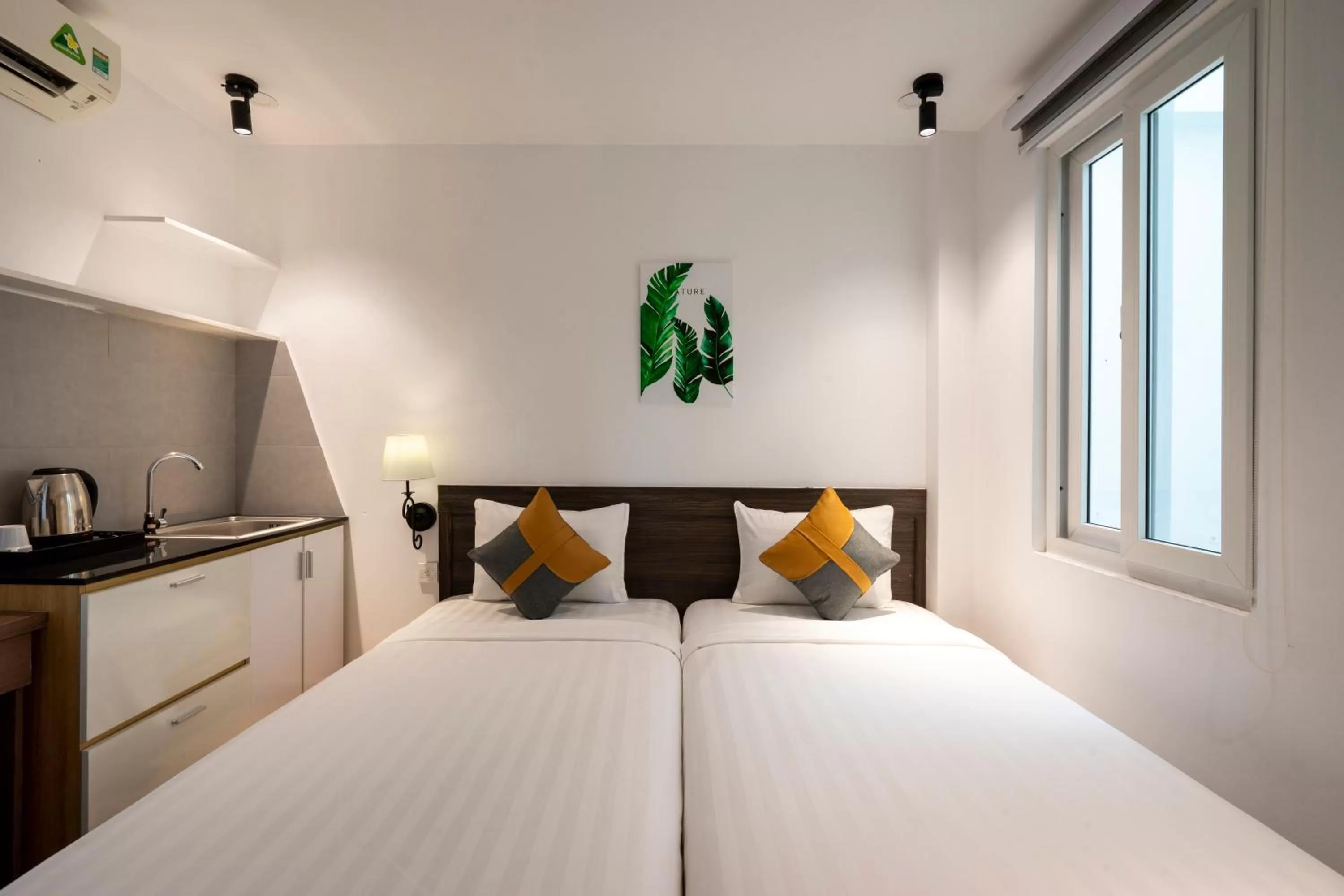 Photo of the whole room, Bed in La Airport Tan Binh Hotel