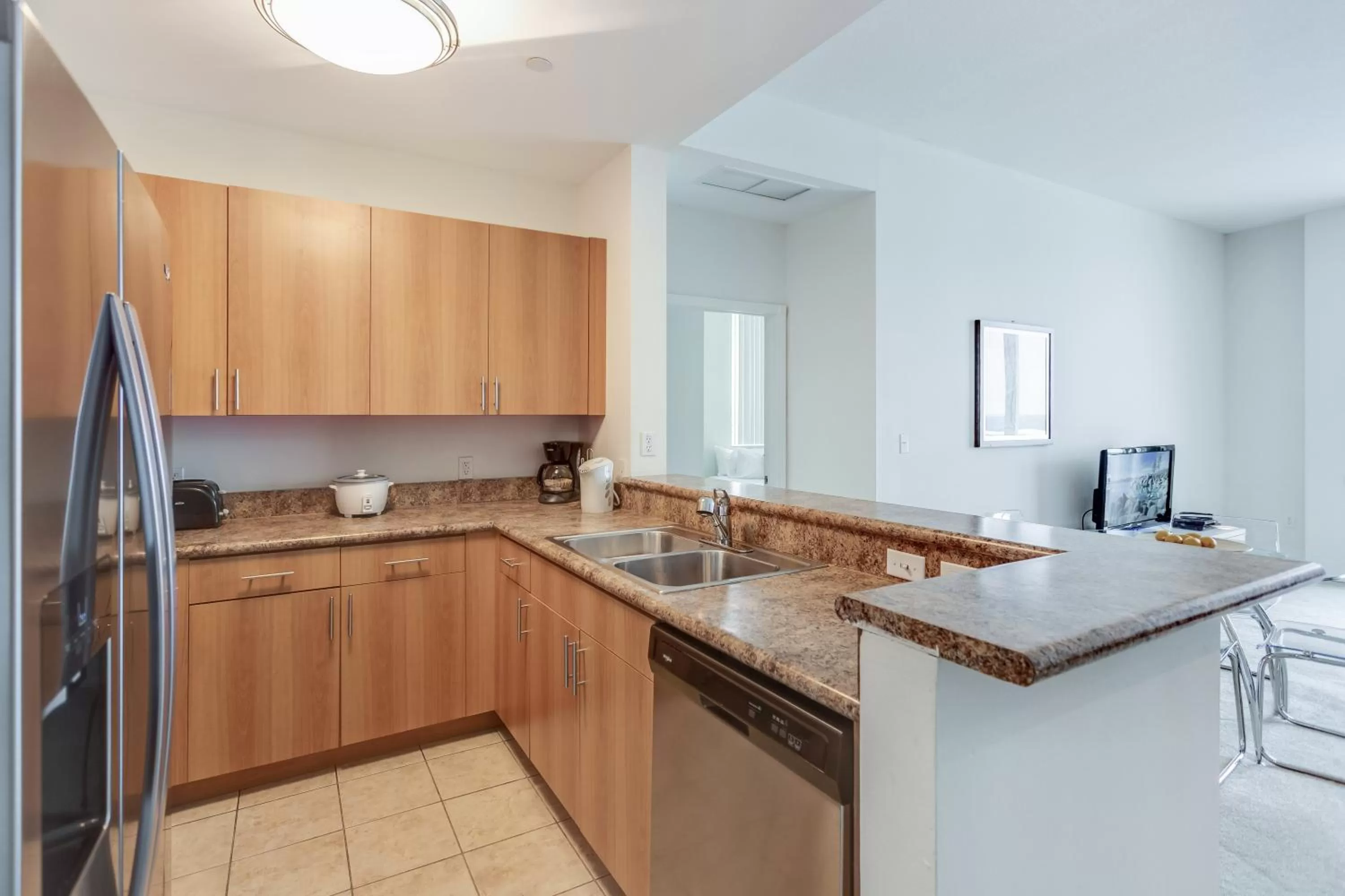 Kitchen or kitchenette in Dadeland Towers by Miami Vacations