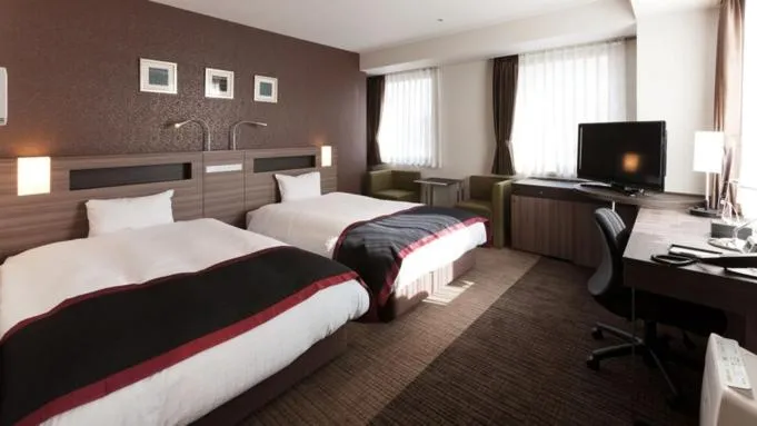 Bed in Onomichi Kokusai Hotel