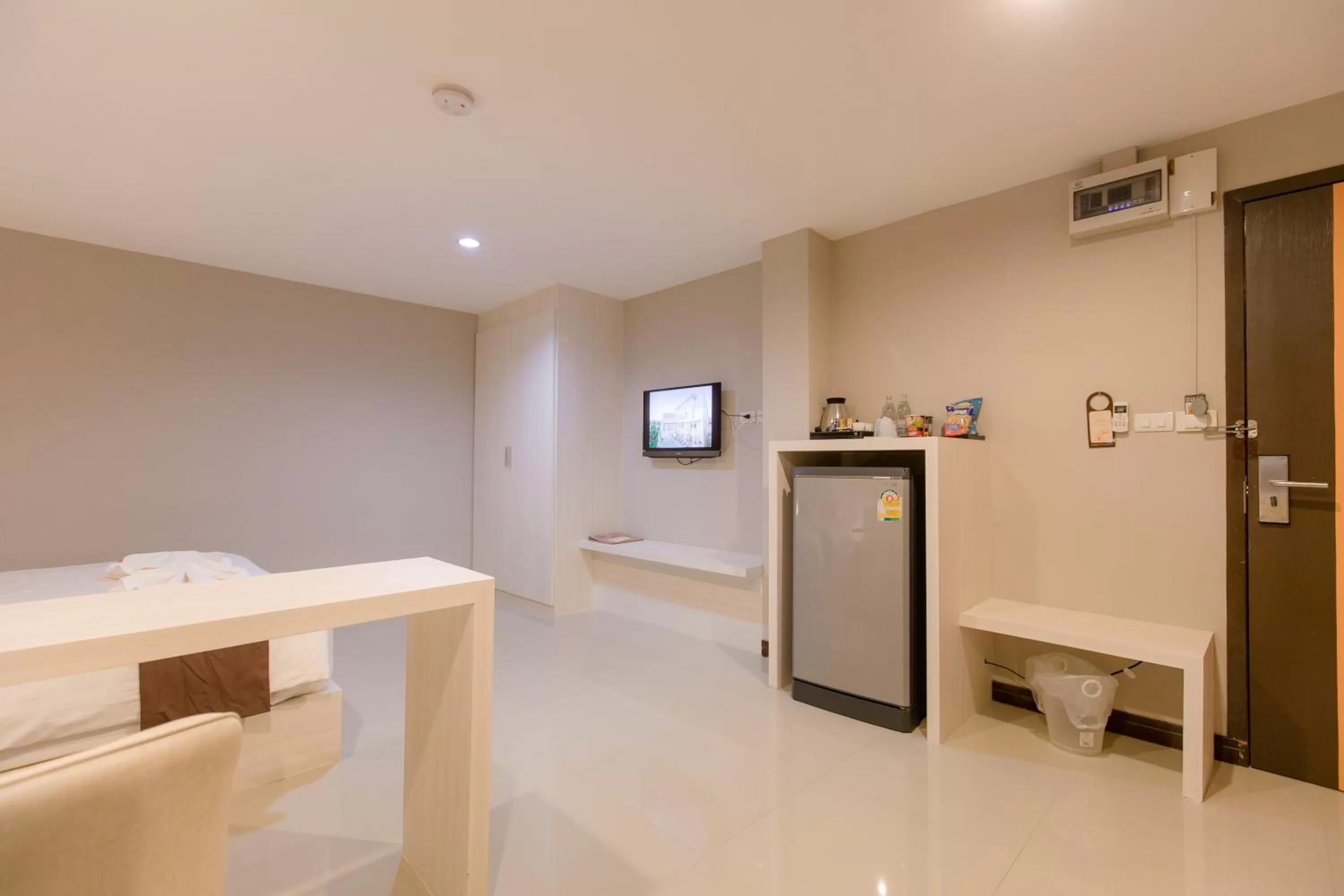 Bed in De Hug Hotel & Residence