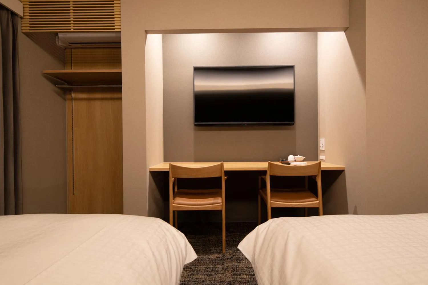 Communal lounge/ TV room, Bed in Hotel Celeste Shizuoka