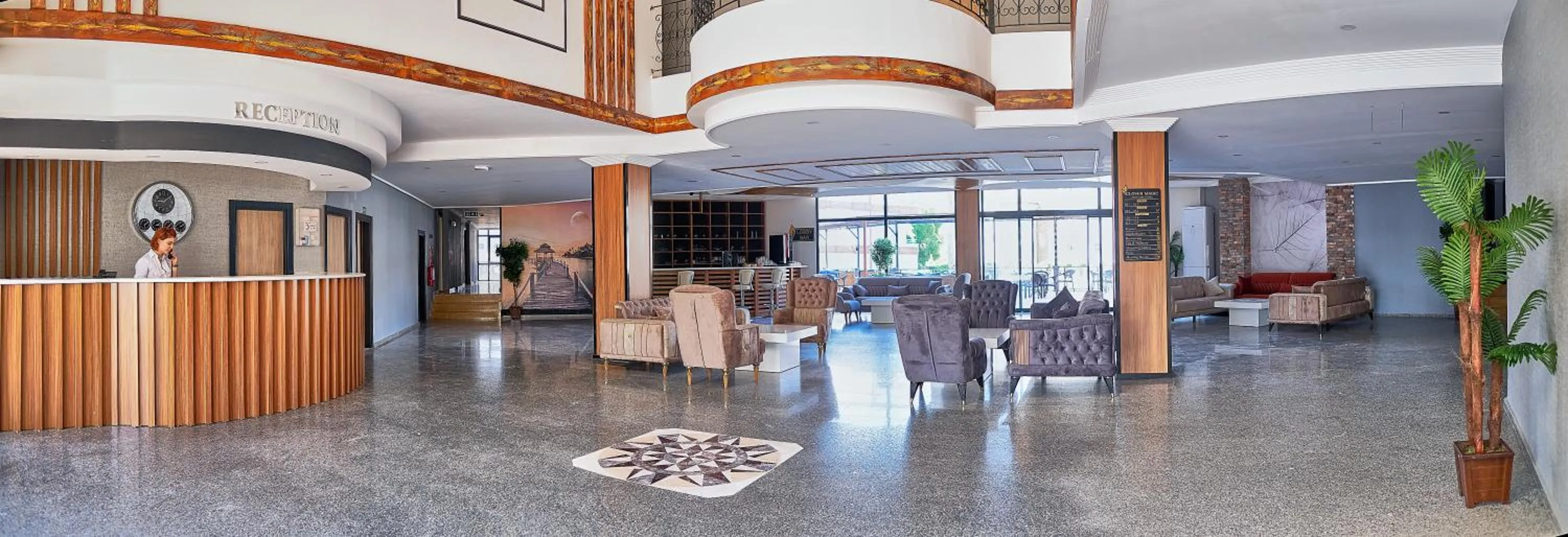 Staff in Clover Magic Park Side Hotel