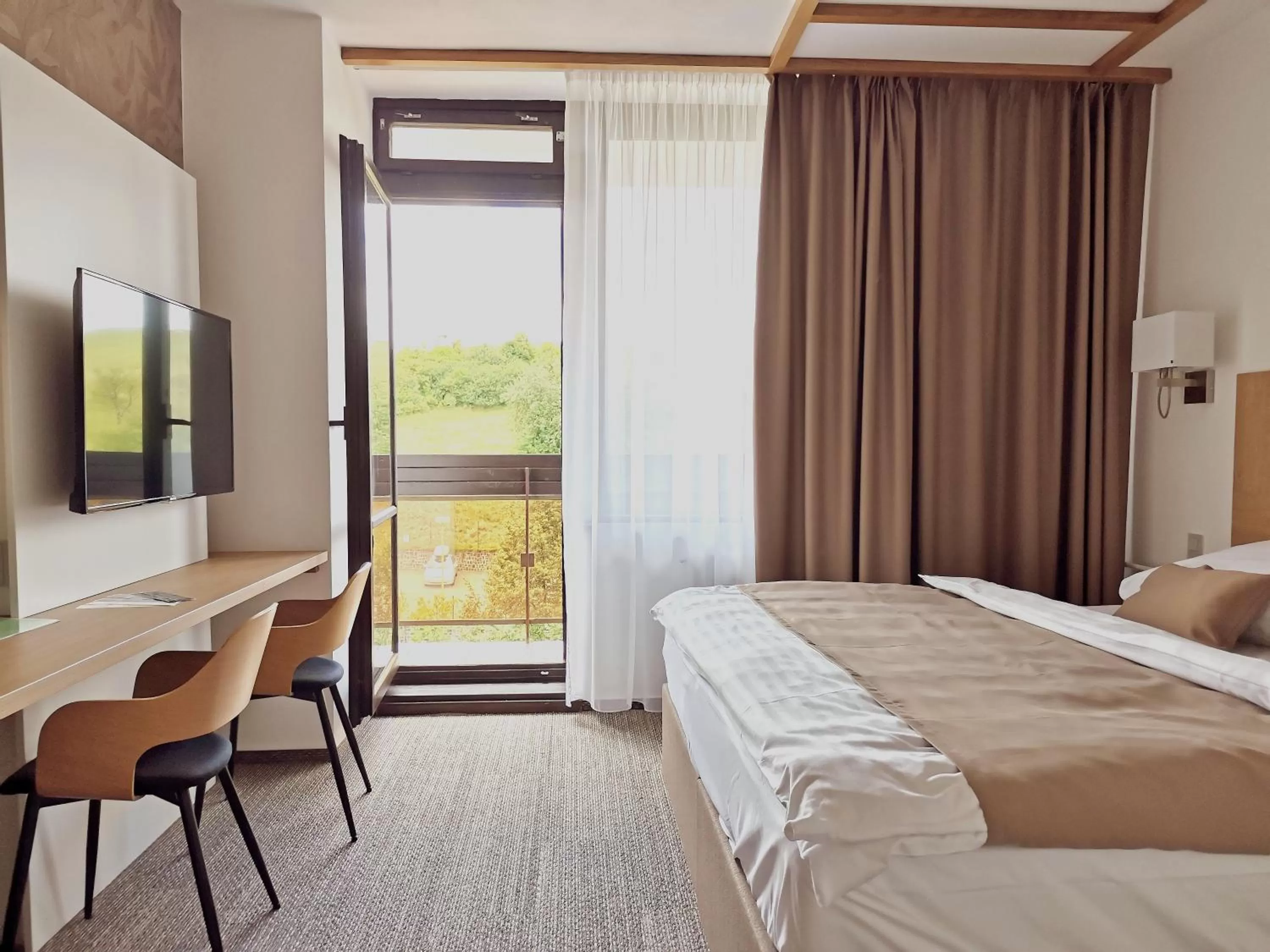 Bed in Hotel Adamantino