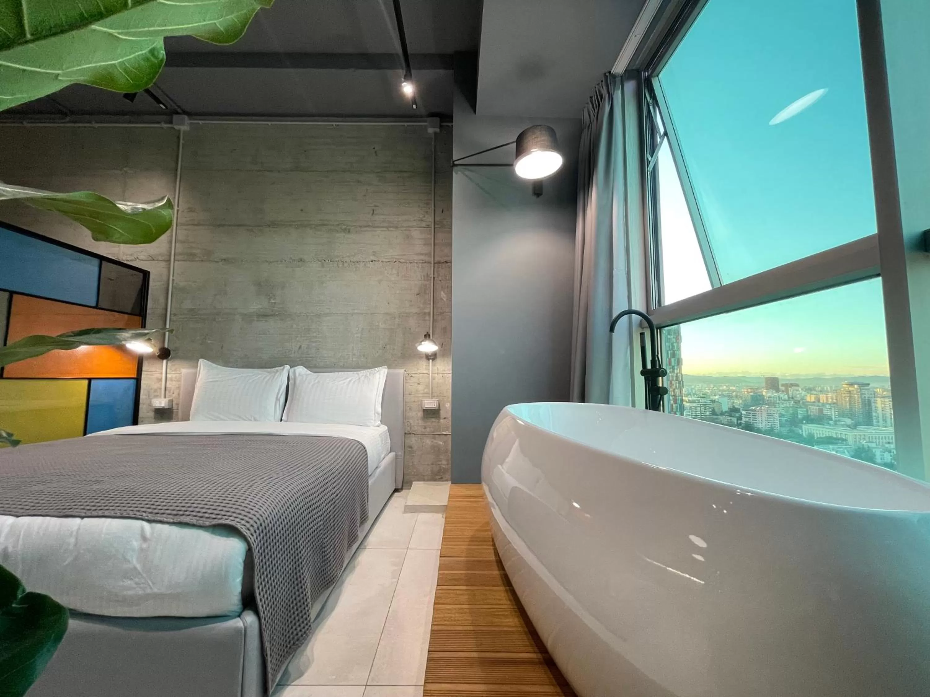 Bed in Ambassador Skyline Apartments