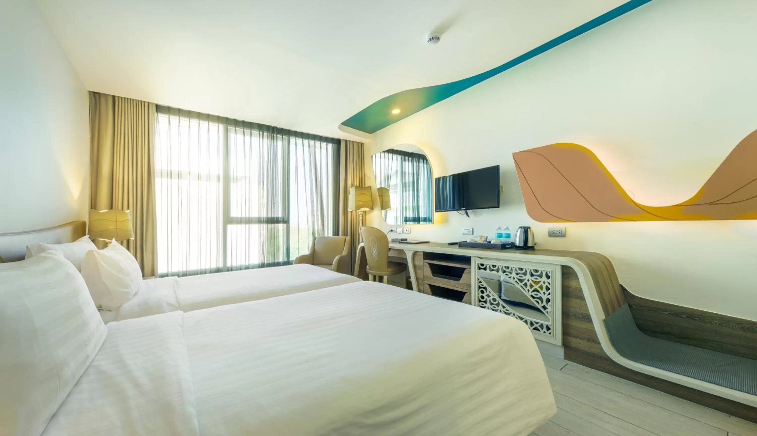 Coffee/tea facilities, Bed in Le Tada Parkview Hotel