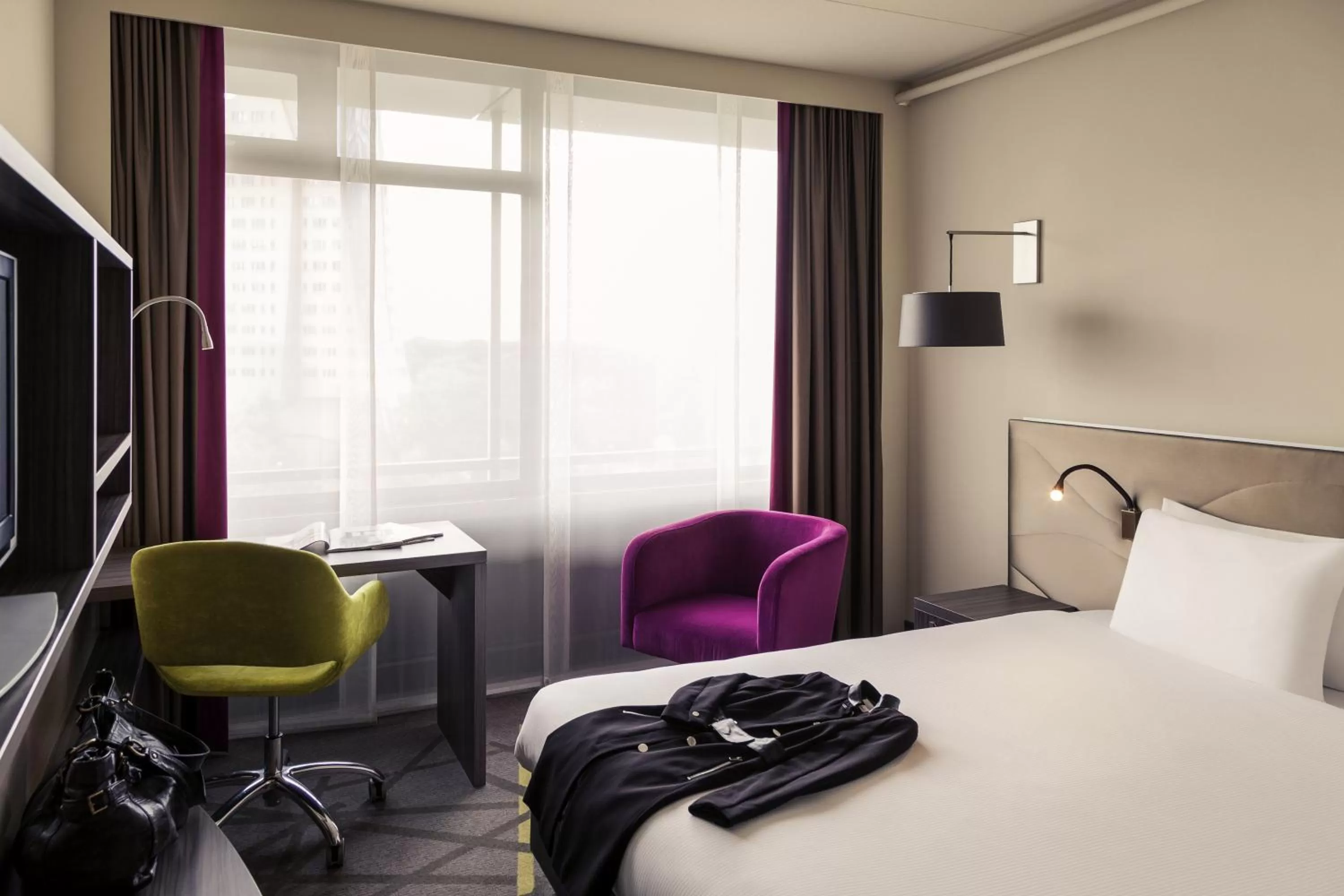 Photo of the whole room, Bed in Mercure Hotel Groningen Martiniplaza