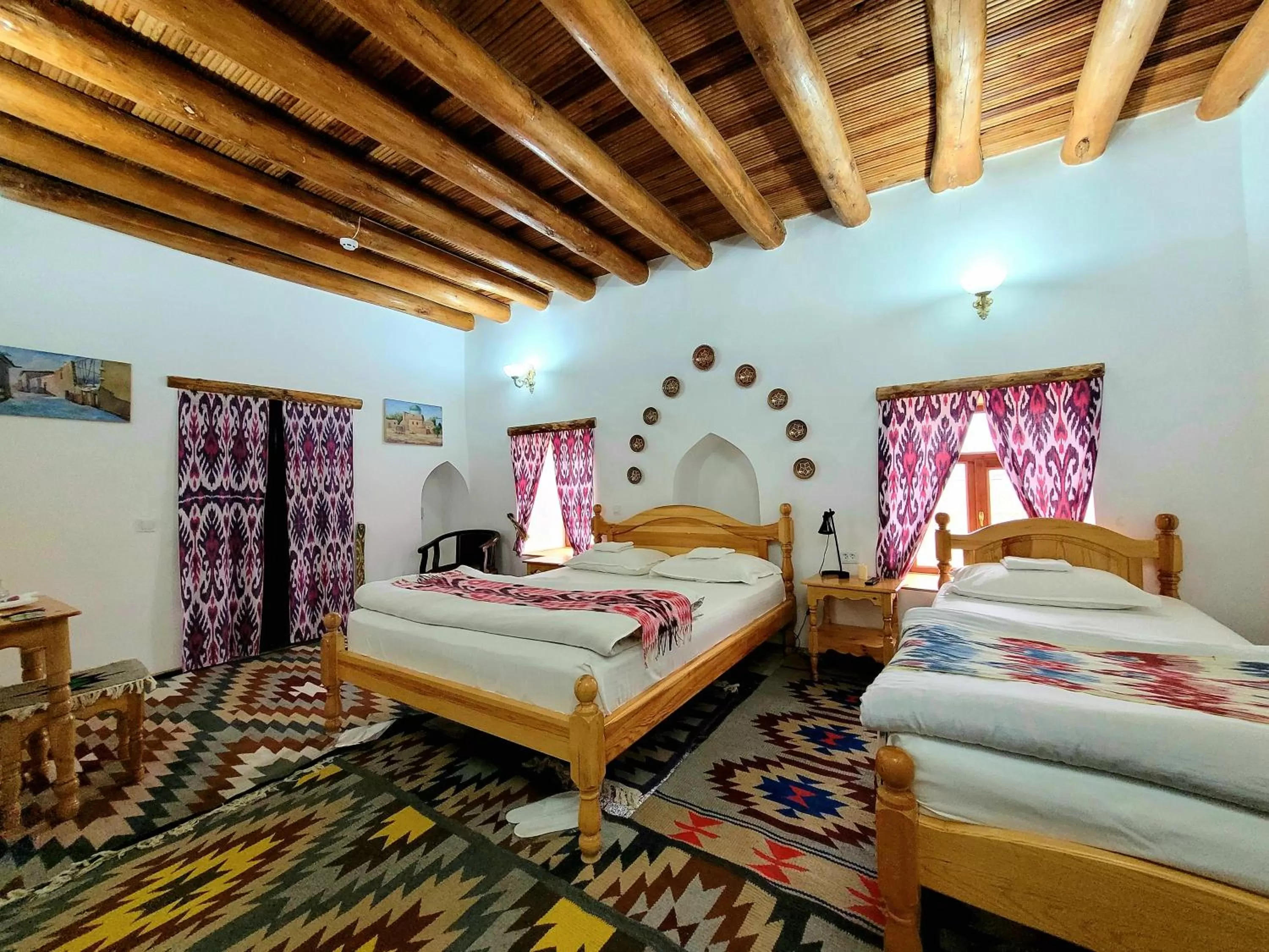 Bed in madrasah Polvon-Qori boutique hotel