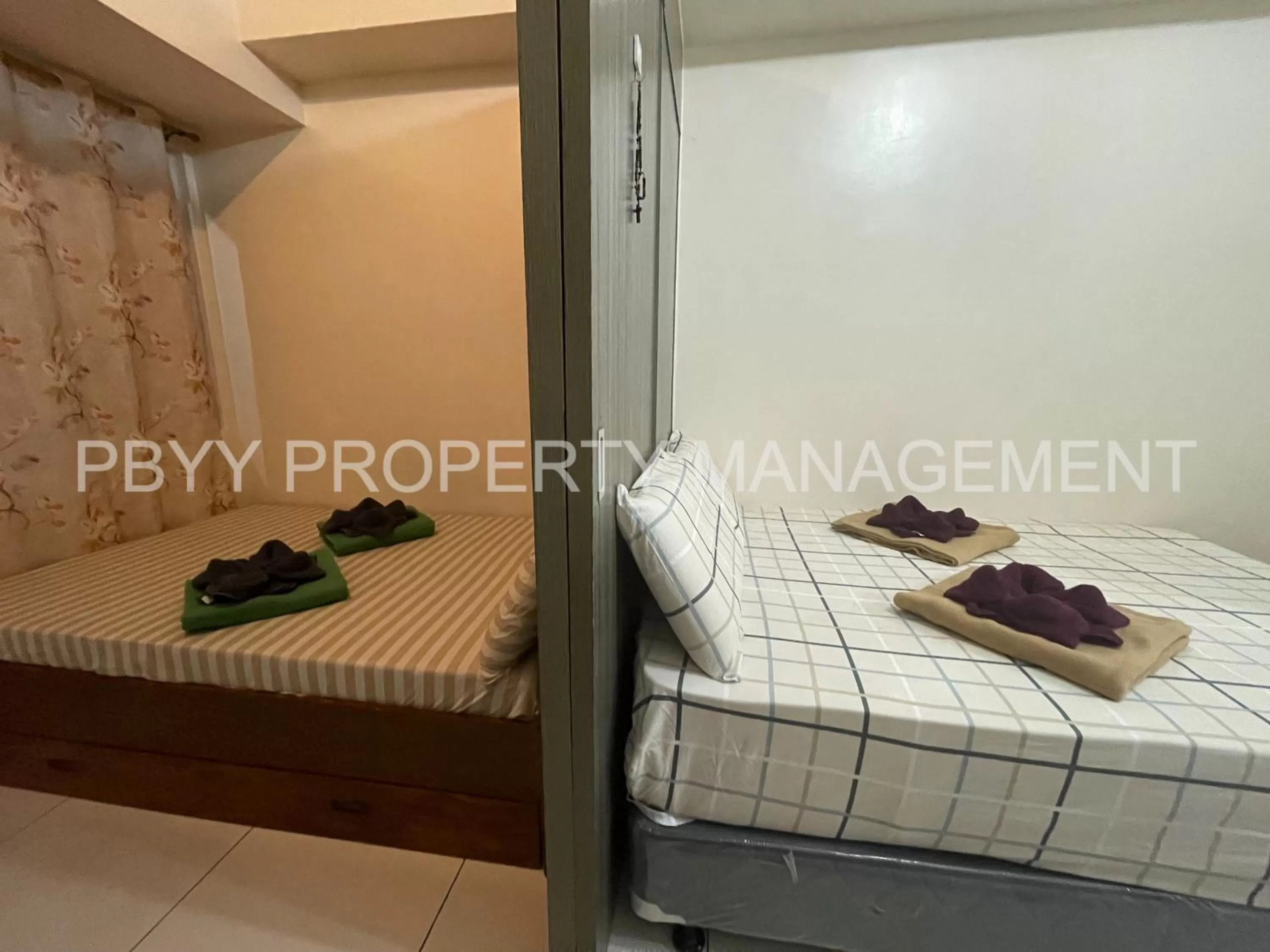 Photo of the whole room, Bed in Green Residences Staycation by PBYY