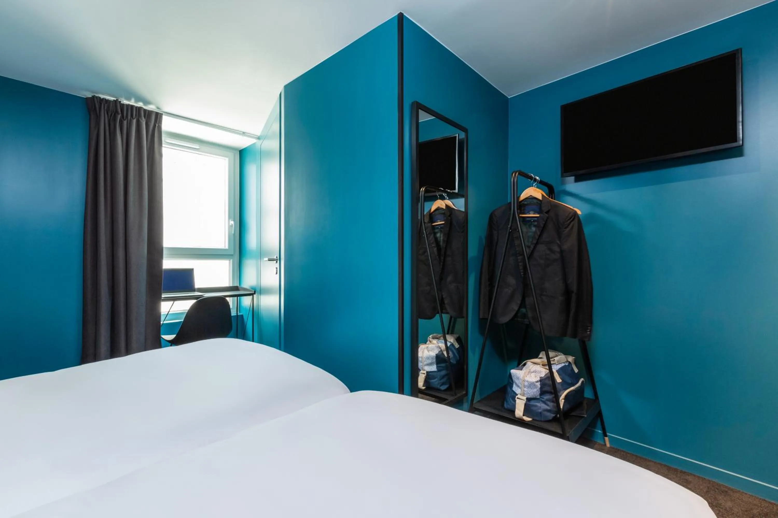 Photo of the whole room, Bed in Ibis Styles Paris Gare de l'Est Magenta