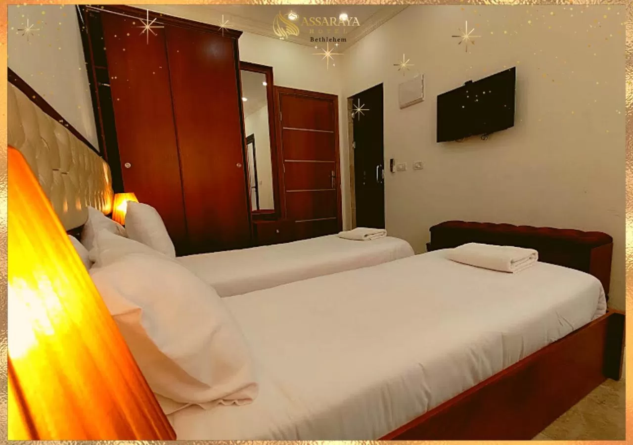 Bed in Assaraya Palace Hotel