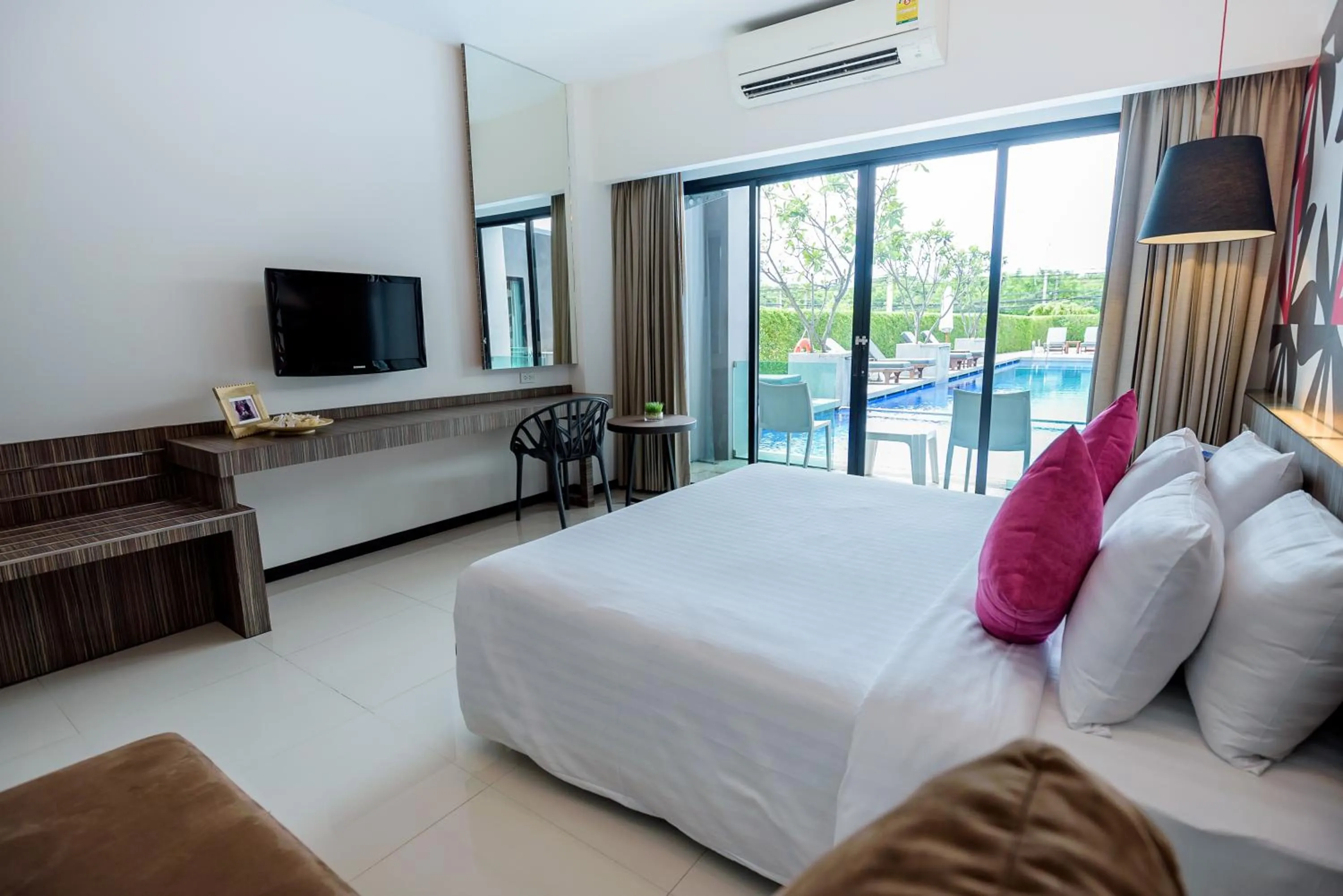 Bed in Hotel J Residence Pattaya