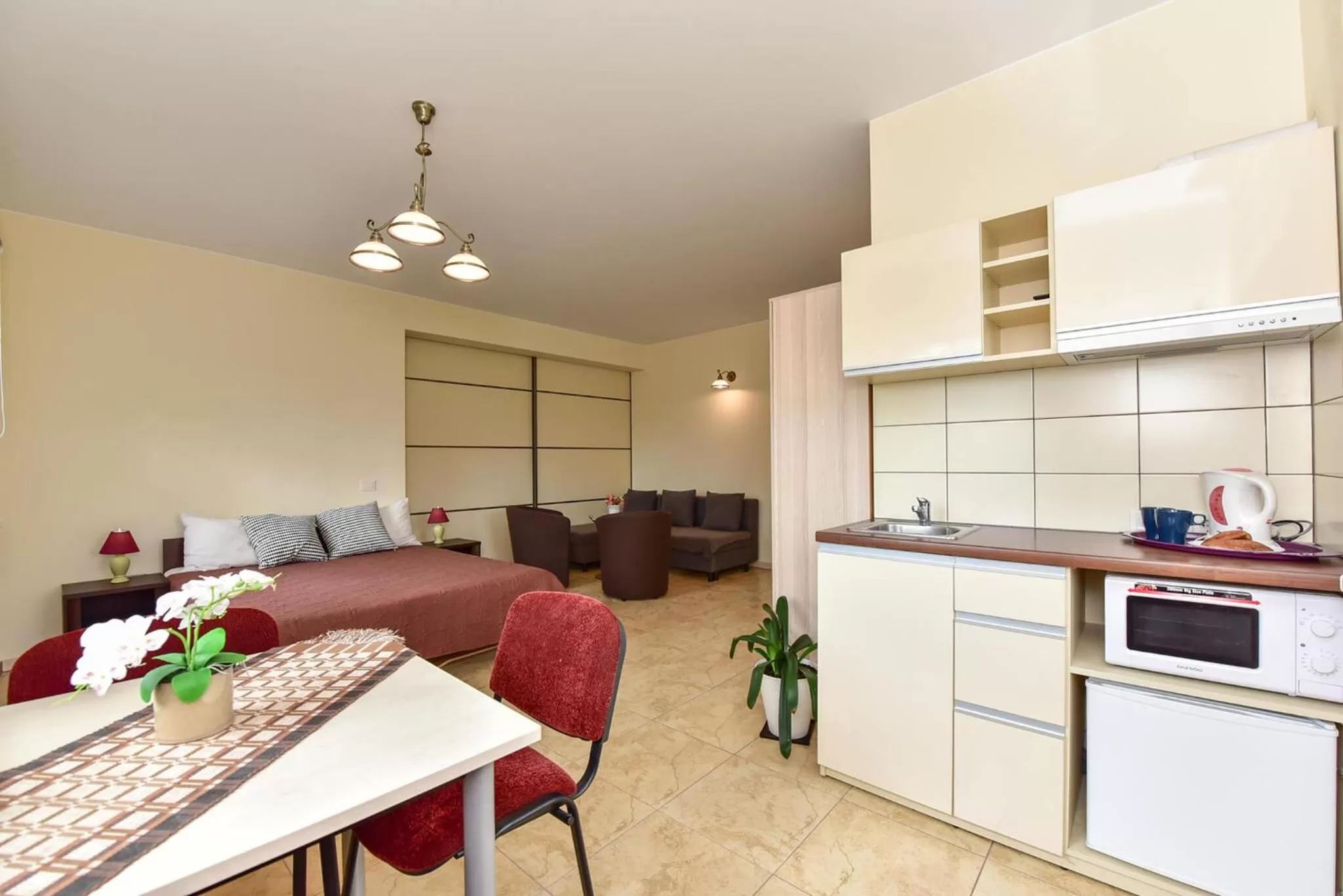 Photo of the whole room, Kitchen/Kitchenette in "Trakaitis" apartments in Villa
