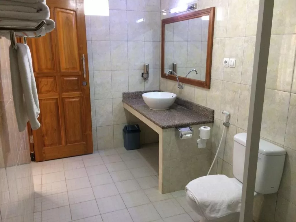 Bathroom in Astina Hotel