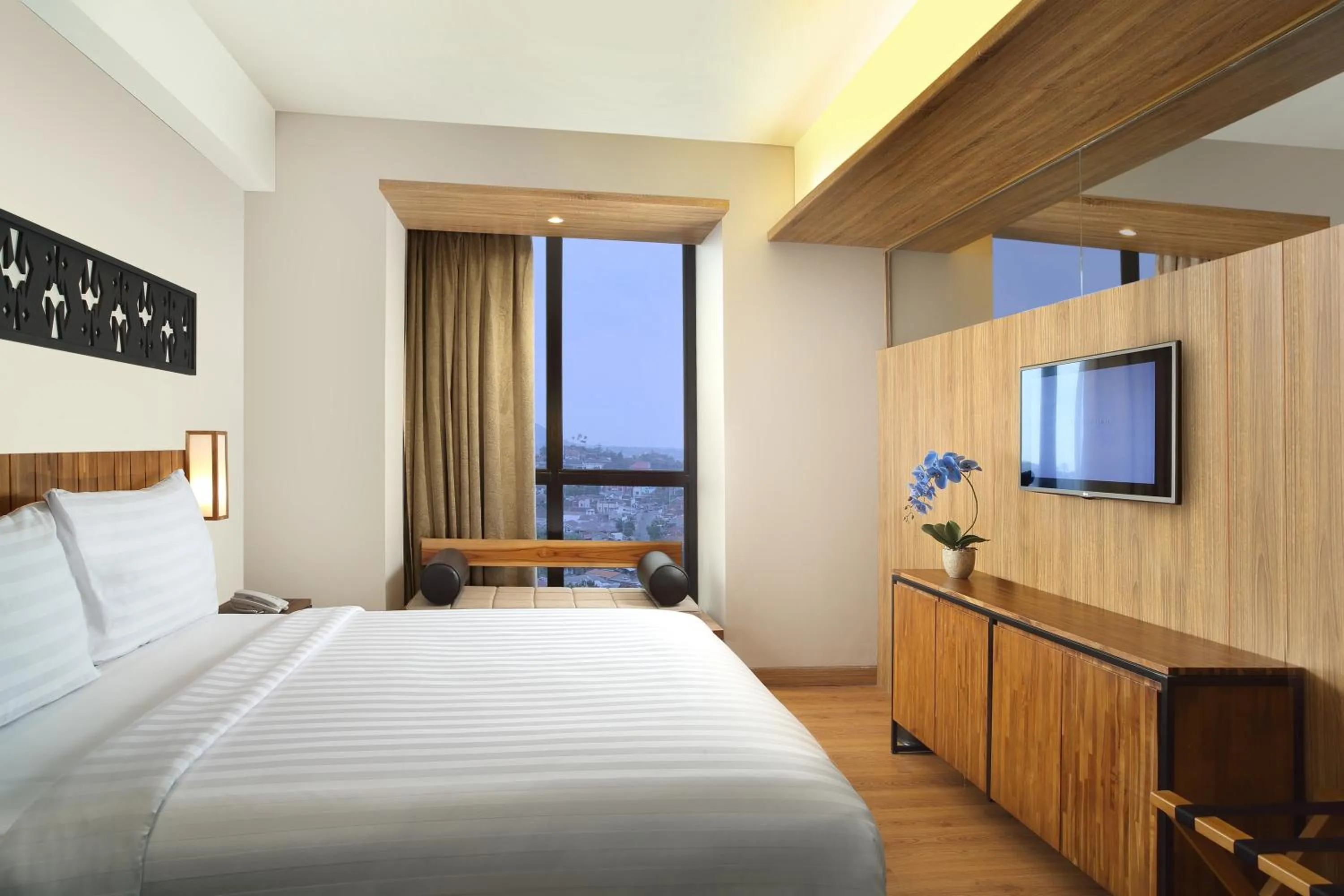 Property building, Bed in BATIQA Hotel Lampung