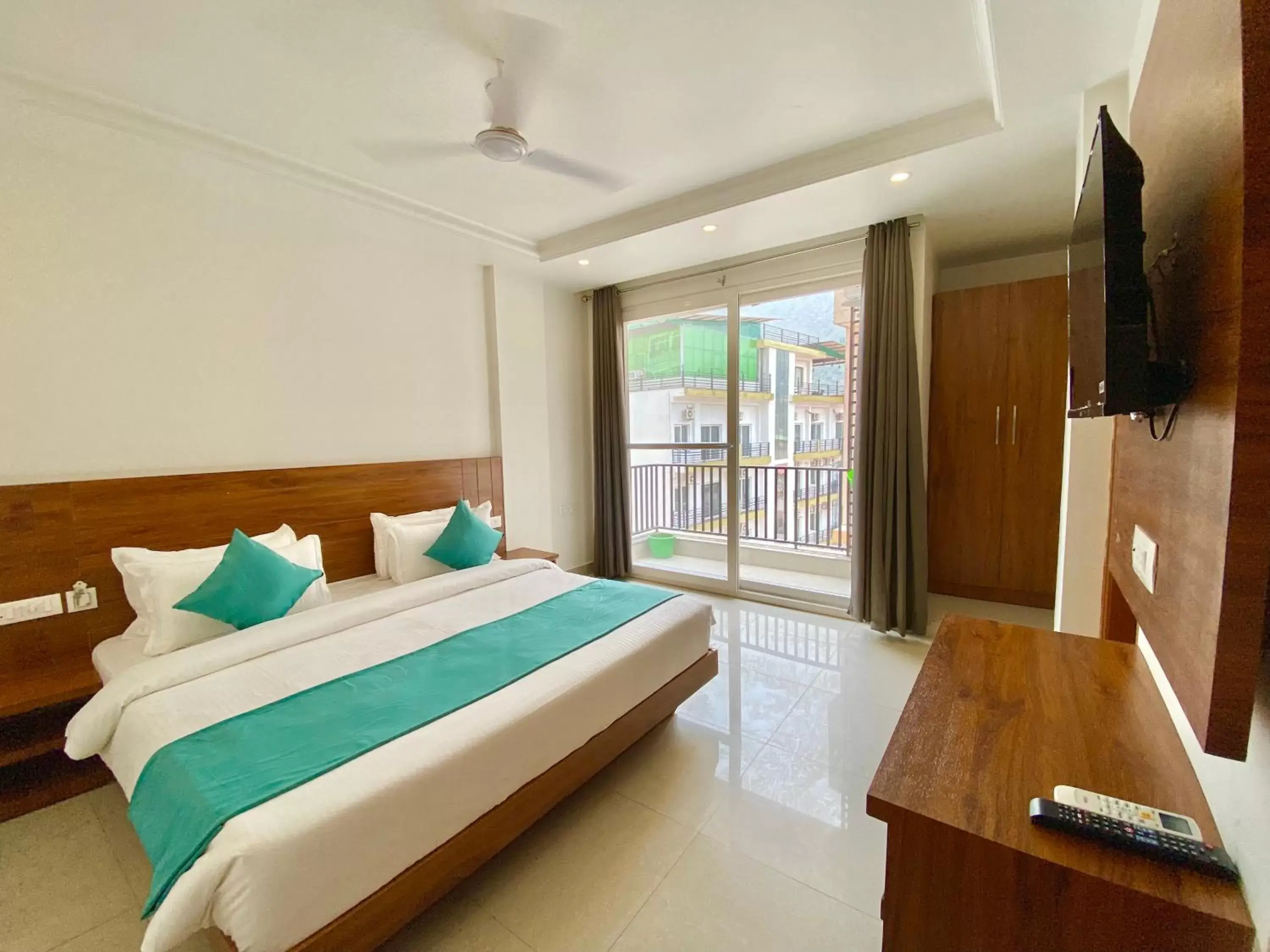 Deluxe Double Room with Balcony in Hotel Namami Tapovan Deluxe Double Room with Balcony in Hotel Namami Tapovan