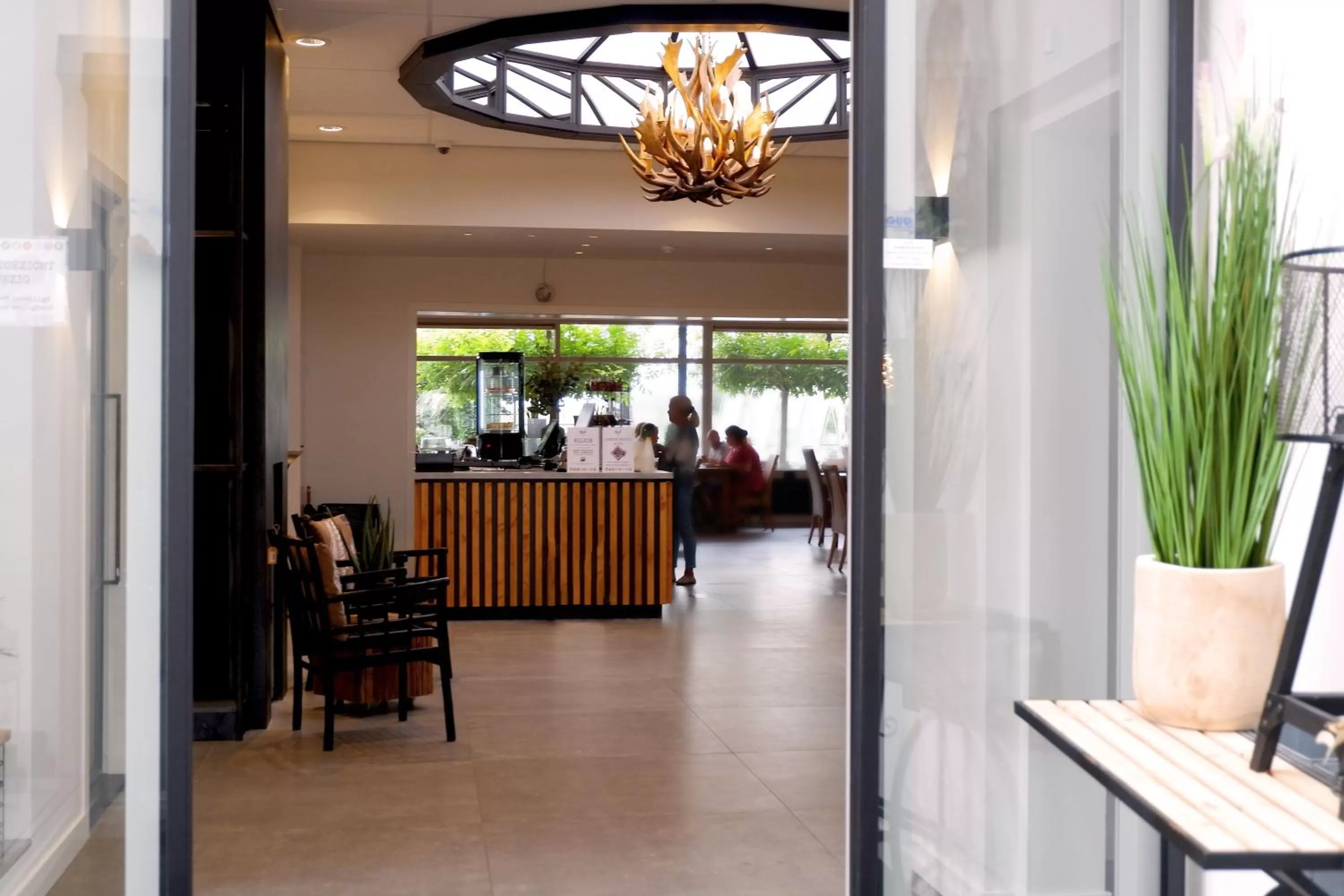 Lobby or reception in Hajé Hotel Joure