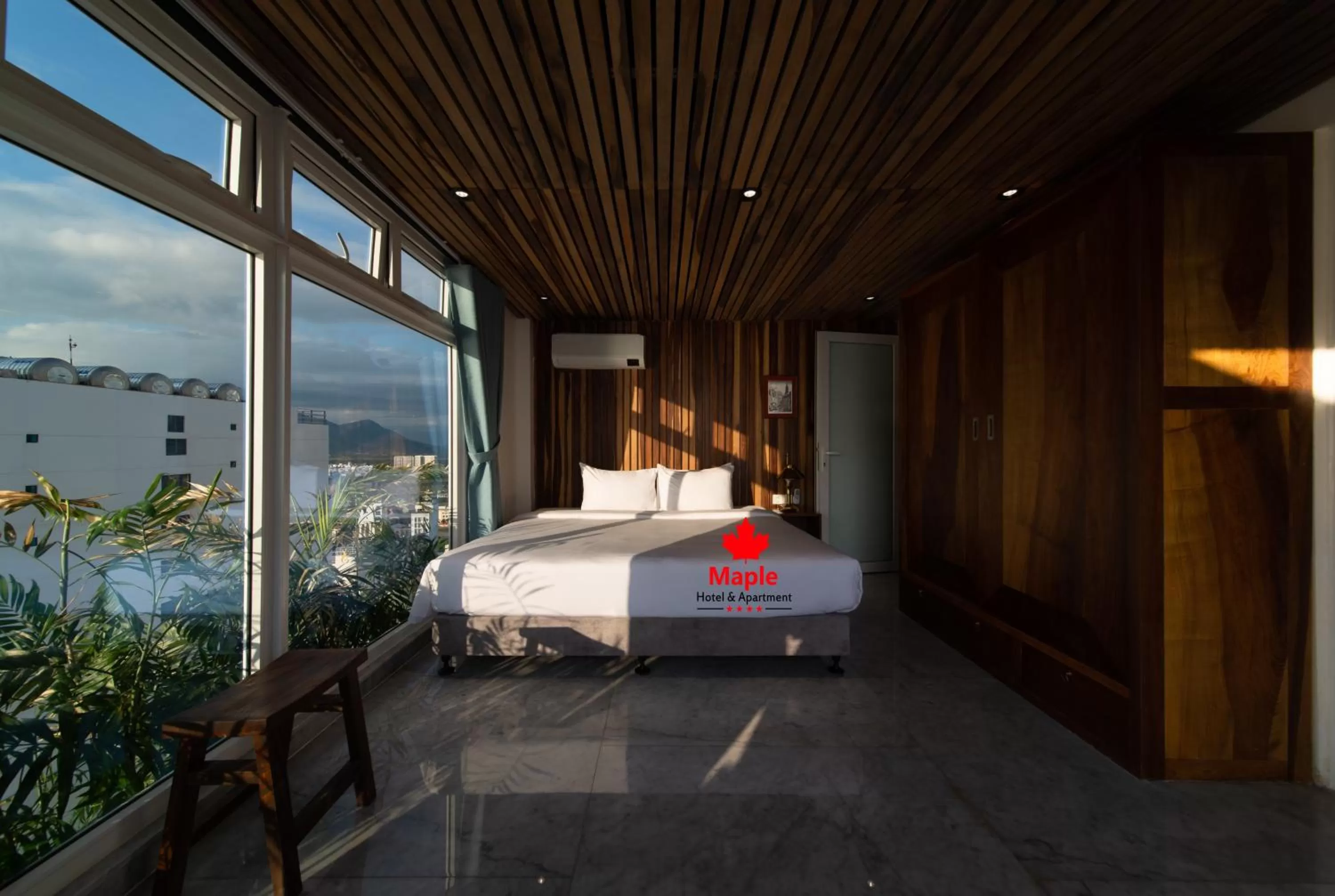 Bed in Maple Hotel & Apartment