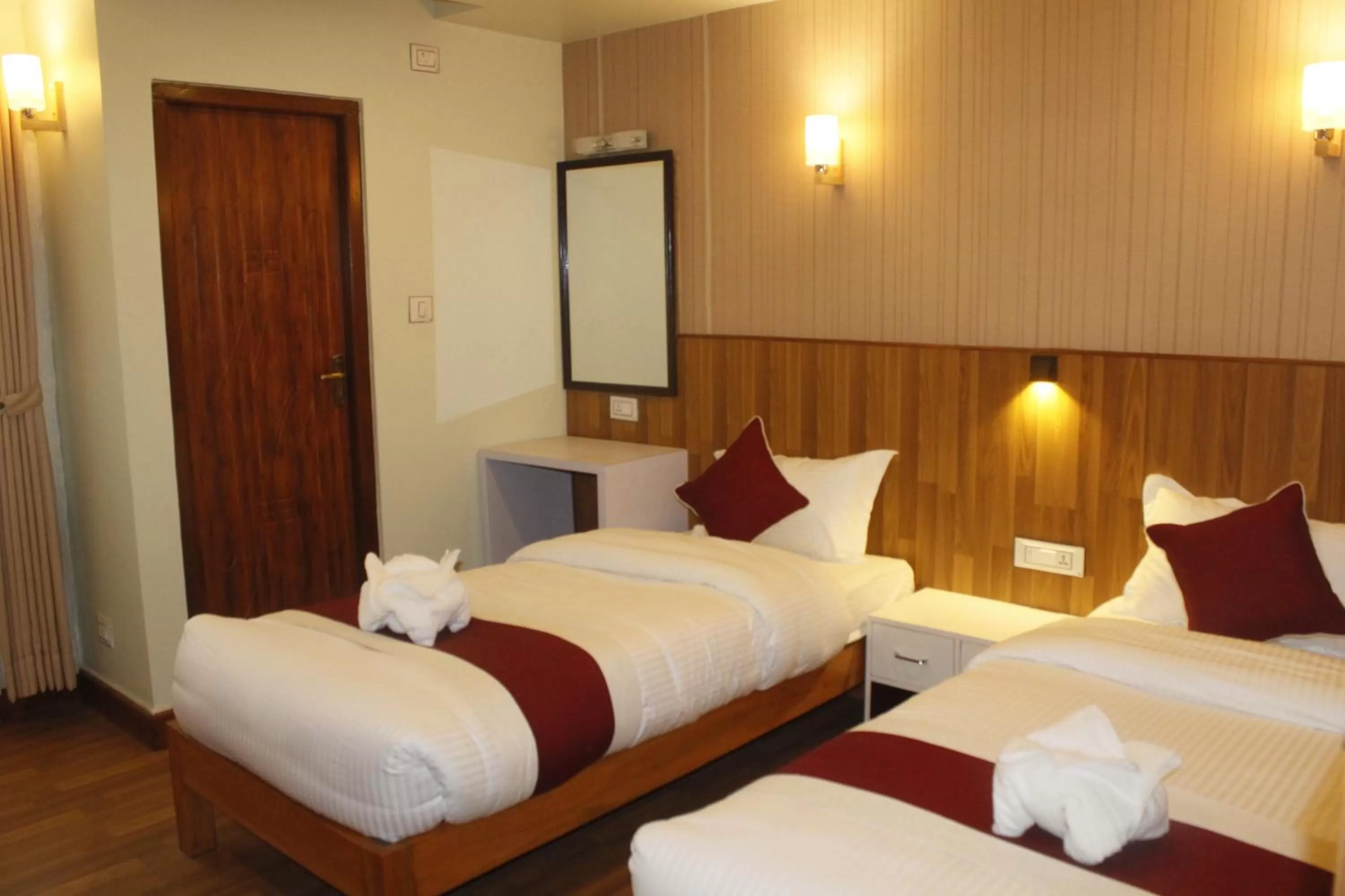 Bedroom, Bed in Hotel Family Ties Pvt. Ltd.