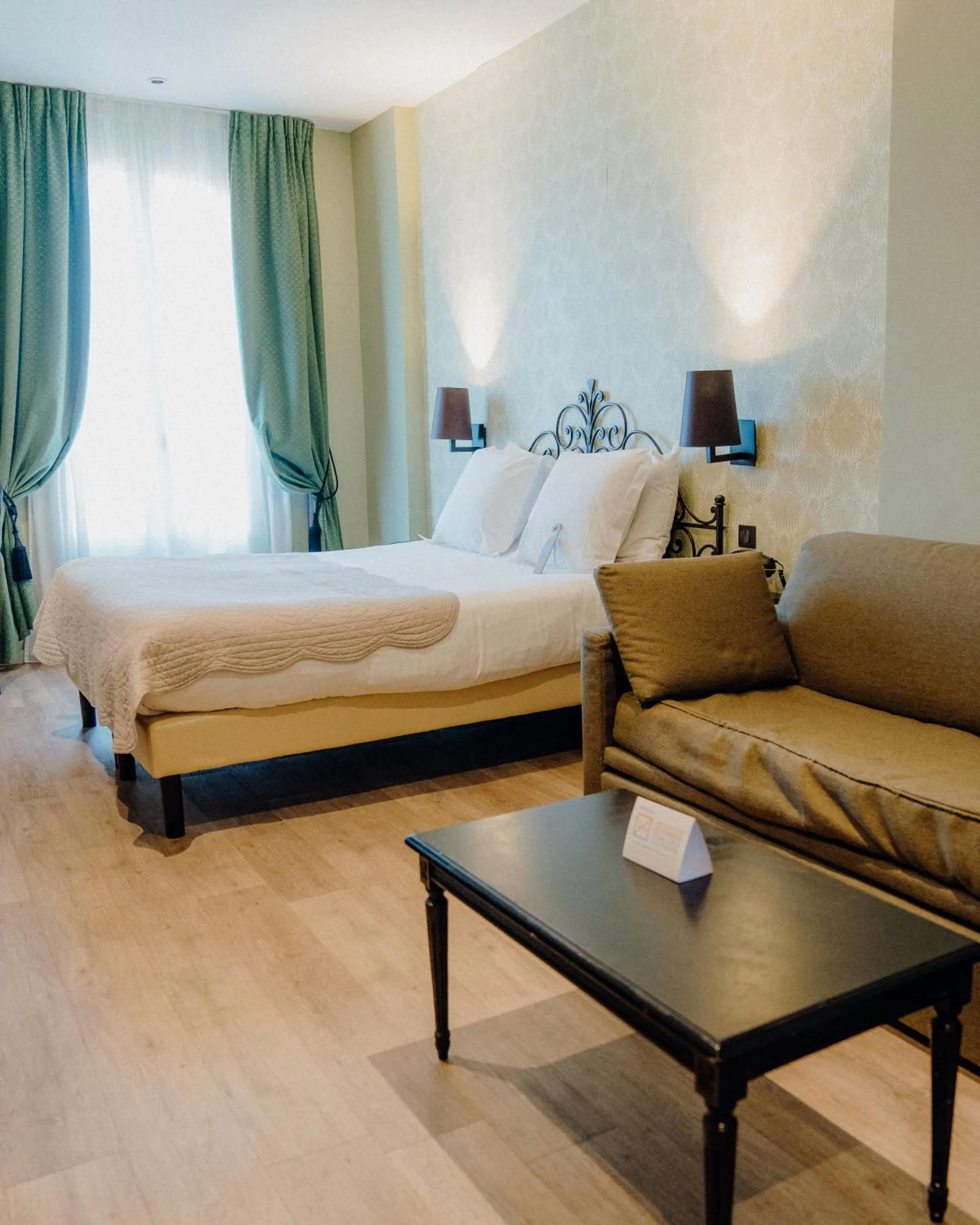 Bed in Hotel Le Grimaldi by Happyculture