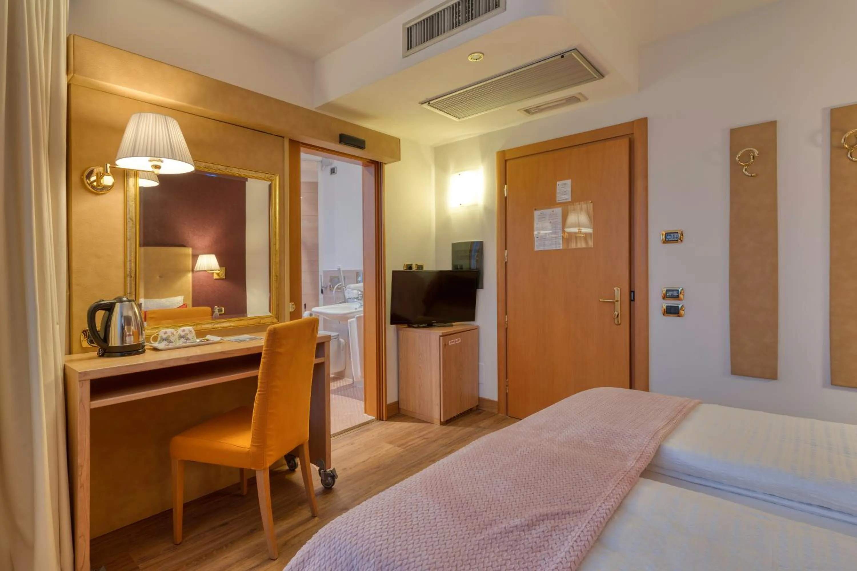 Photo of the whole room, Bed in Hotel Sporting Trento