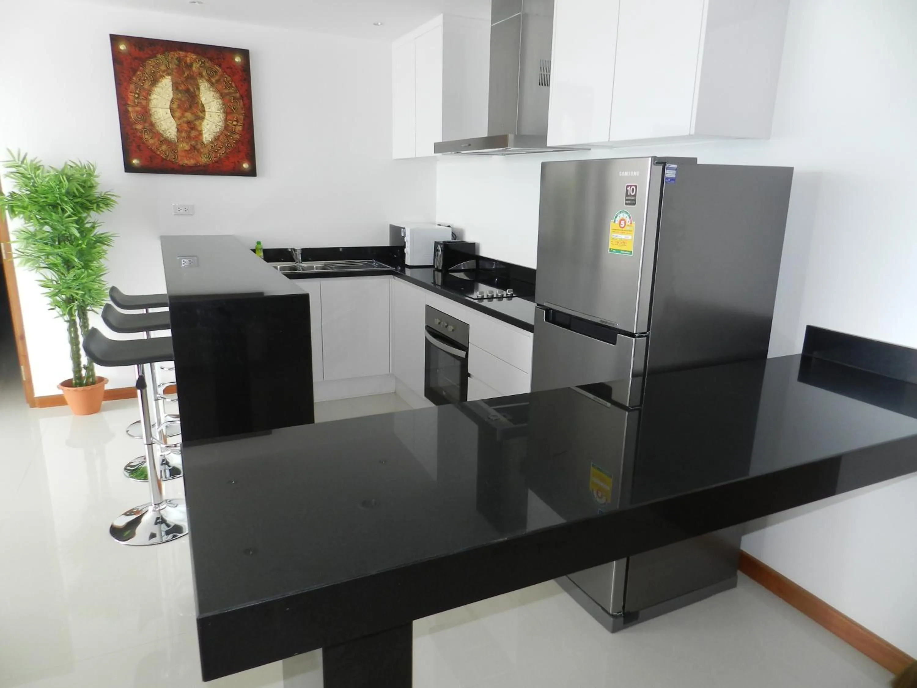 Kitchen or kitchenette in Tropical Sea View Residence