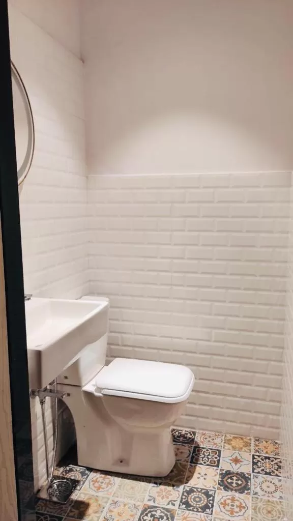 Toilet, Bathroom in HALF Hotel, Calangute