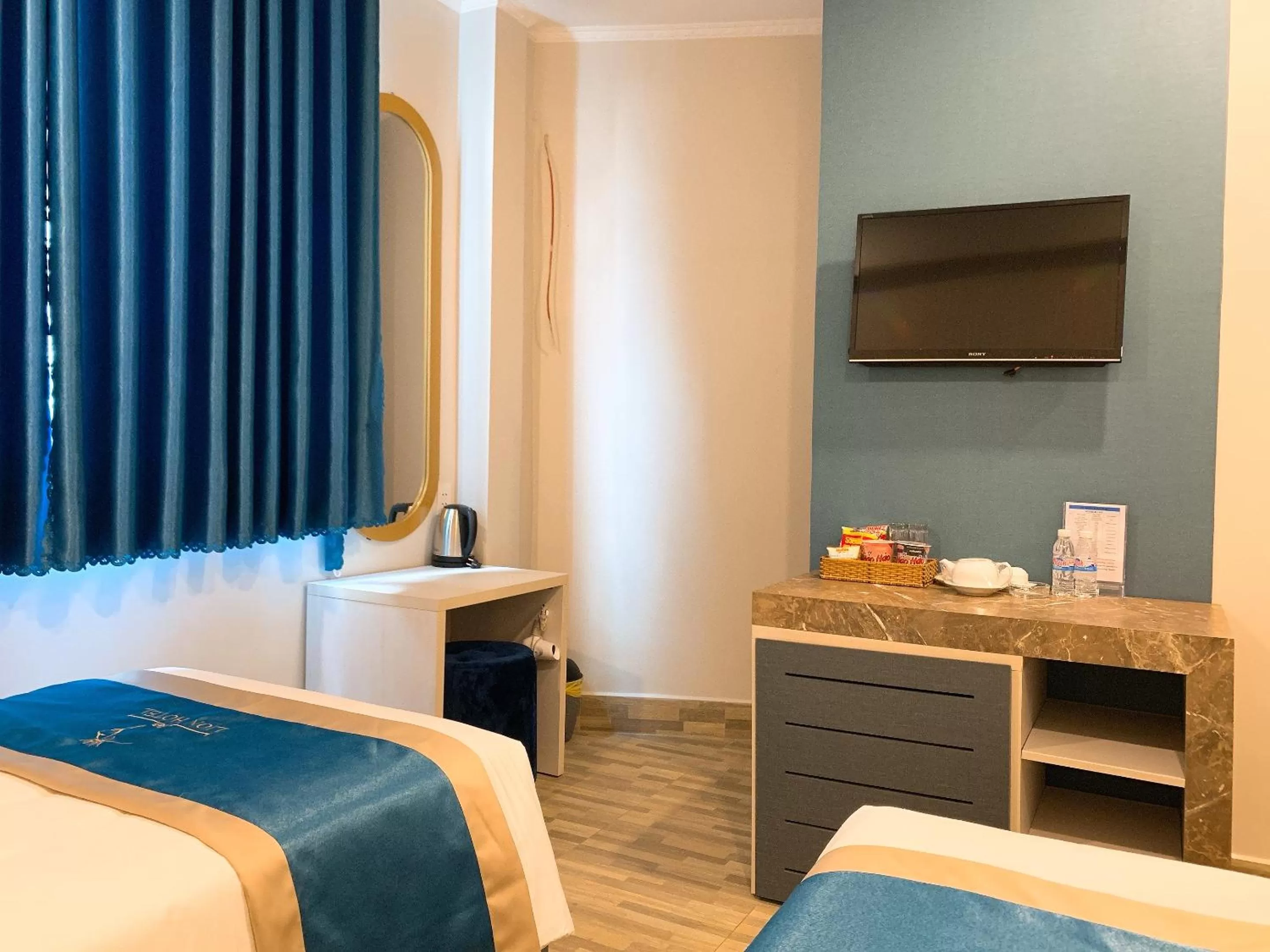 TV and multimedia, TV/Entertainment Center in LION HOTEL