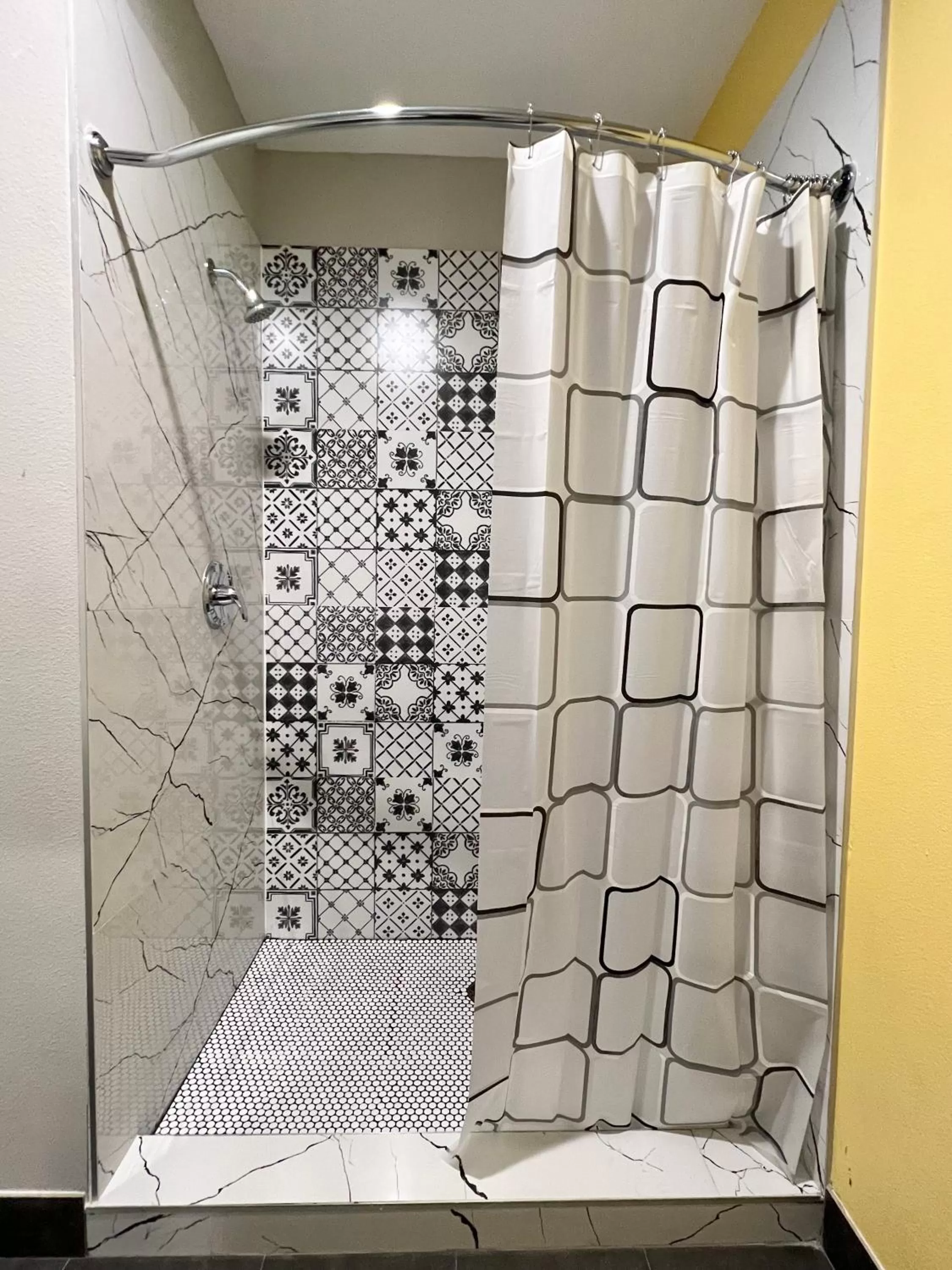 Shower in The Residency Suites